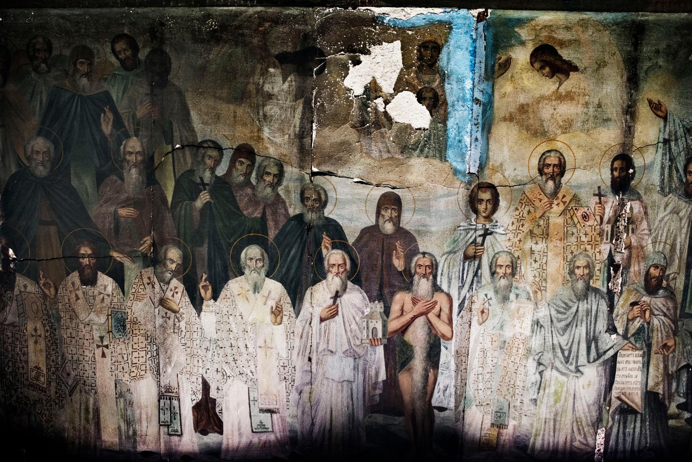 A fresco depicting saints of the Orthodox Church inside the Skete, the monastic community, of St. Andrew, near Karyes, the capital of the of Mount Athos, in northern Greece, May 27, 2016.