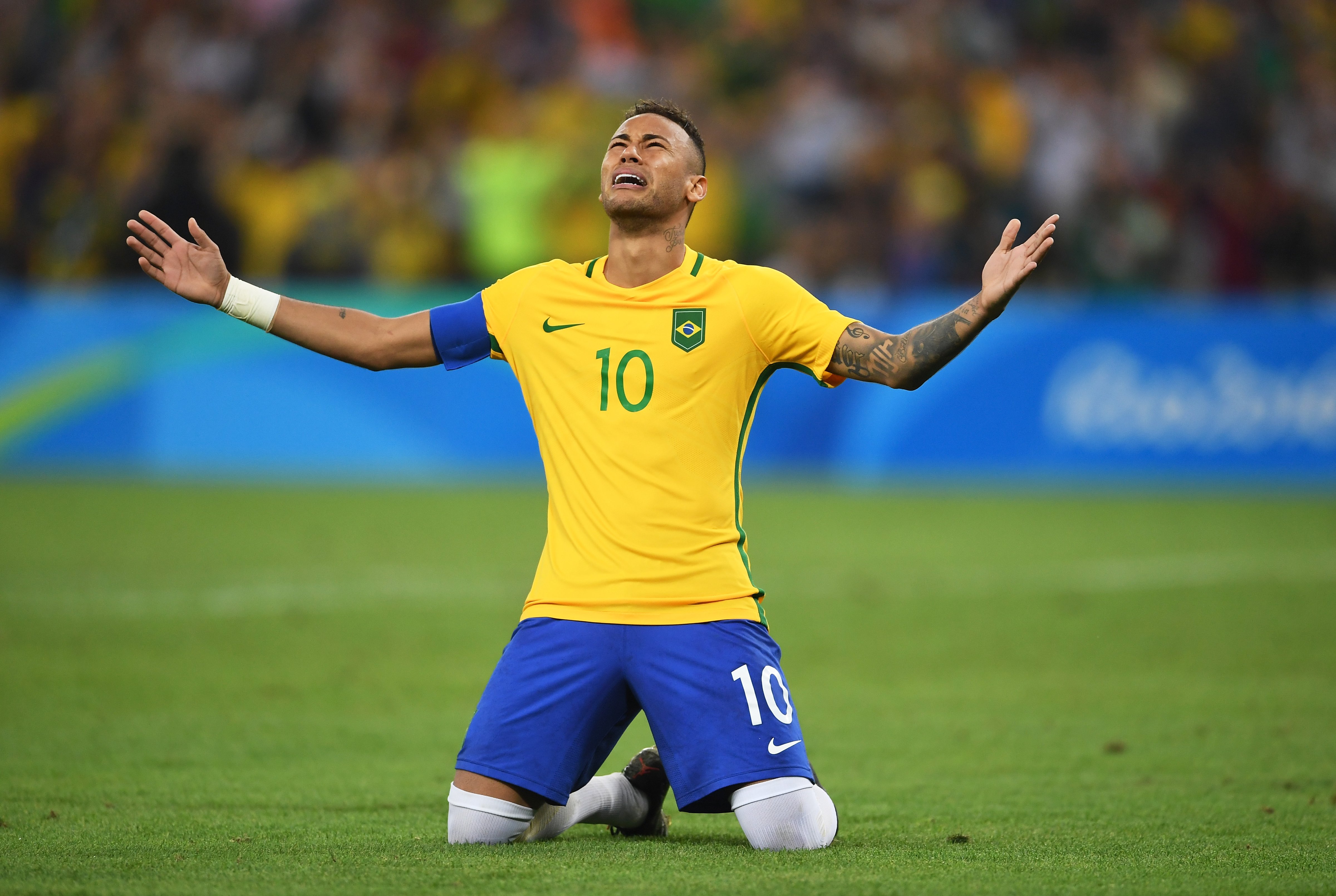 Neymar of Brazil celebrates scoring the winning penalty in the penalty shoot out during the Men's Football Final between Brazil and Germany at the Maracana Stadium on Day 15 of the Rio 2016 Olympic Games on Aug. 20, 2016 in Rio de Janeiro, Brazil. (Laurence Griffiths—Getty Images)