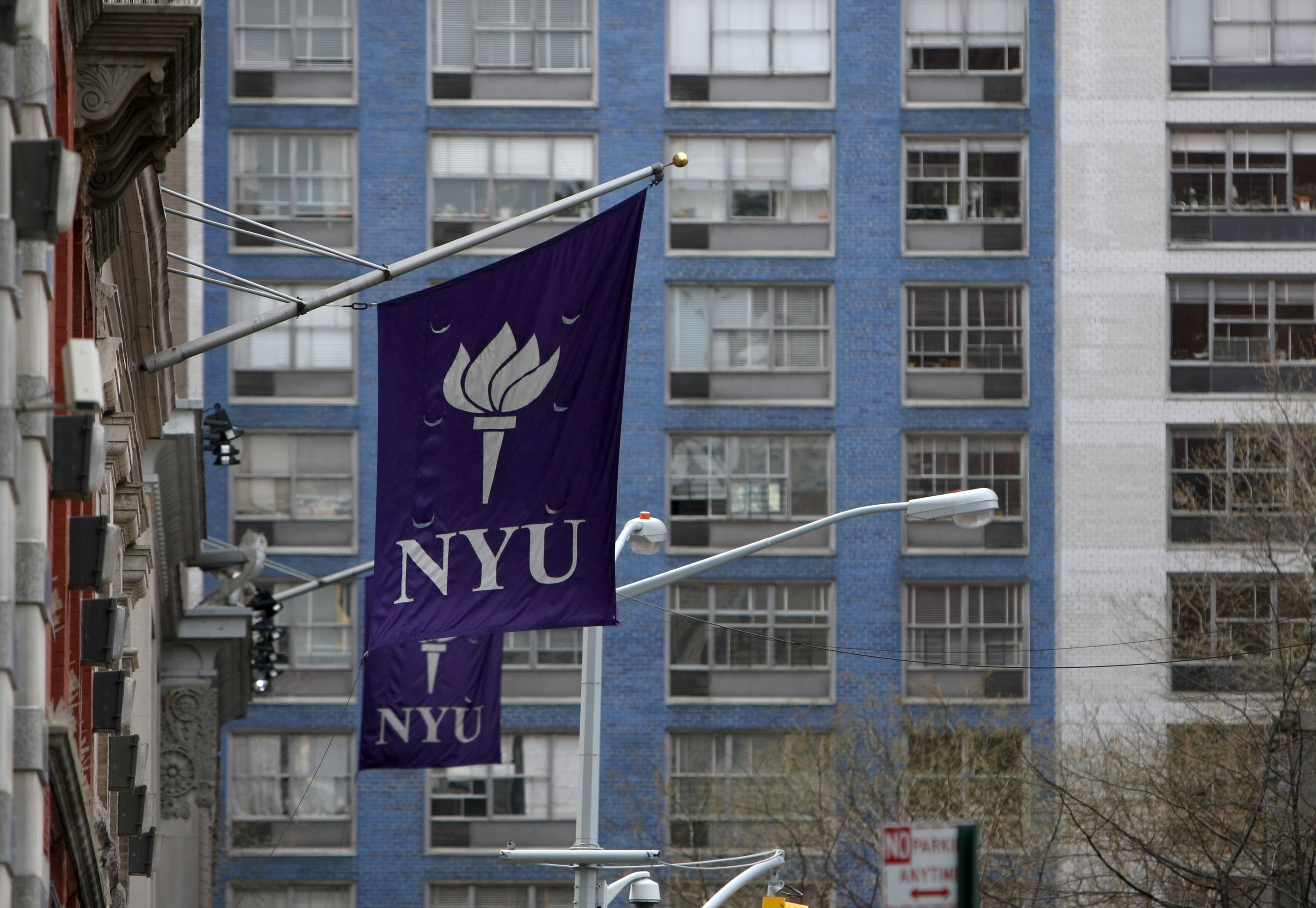 New York University banners hang from a building in New York, U.S., on Monday, April 5, 2010. (Jin Lee—Bloomberg/Getty Images)