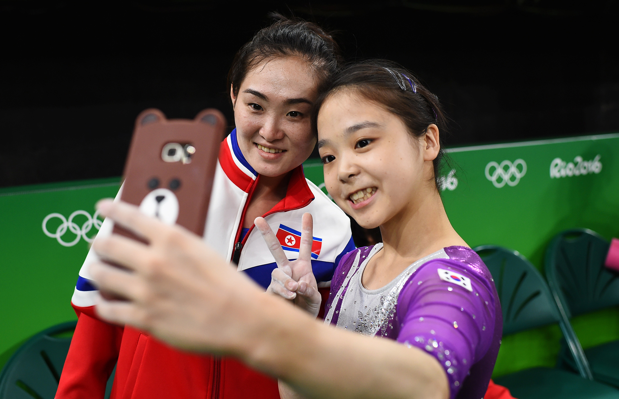 Lee Eun-Ju of South Korea, right, takes a selfie with Hong Un Jong of North Korea, left, on Aug. 4, 2016 in Rio de Janeiro, Brazil.