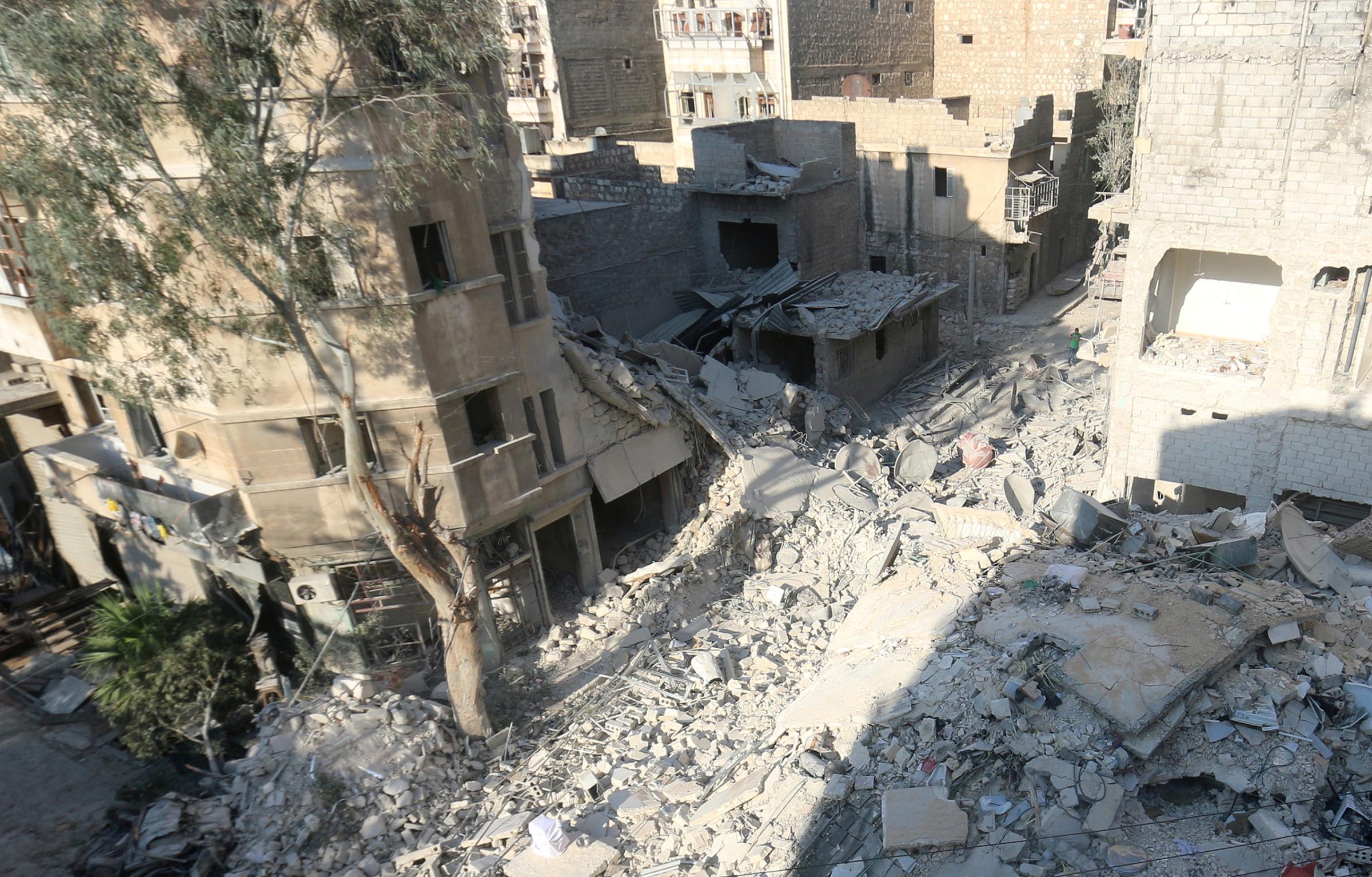 A general view shows the site of the Aug. 17 airstrike where five-year-old Omran Daqneesh and his family were injured in the rebel-held Qaterji neighborhood of Aleppo, Syria, on Aug. 18, 2016. The Daqneesh family lived in the building on the left.