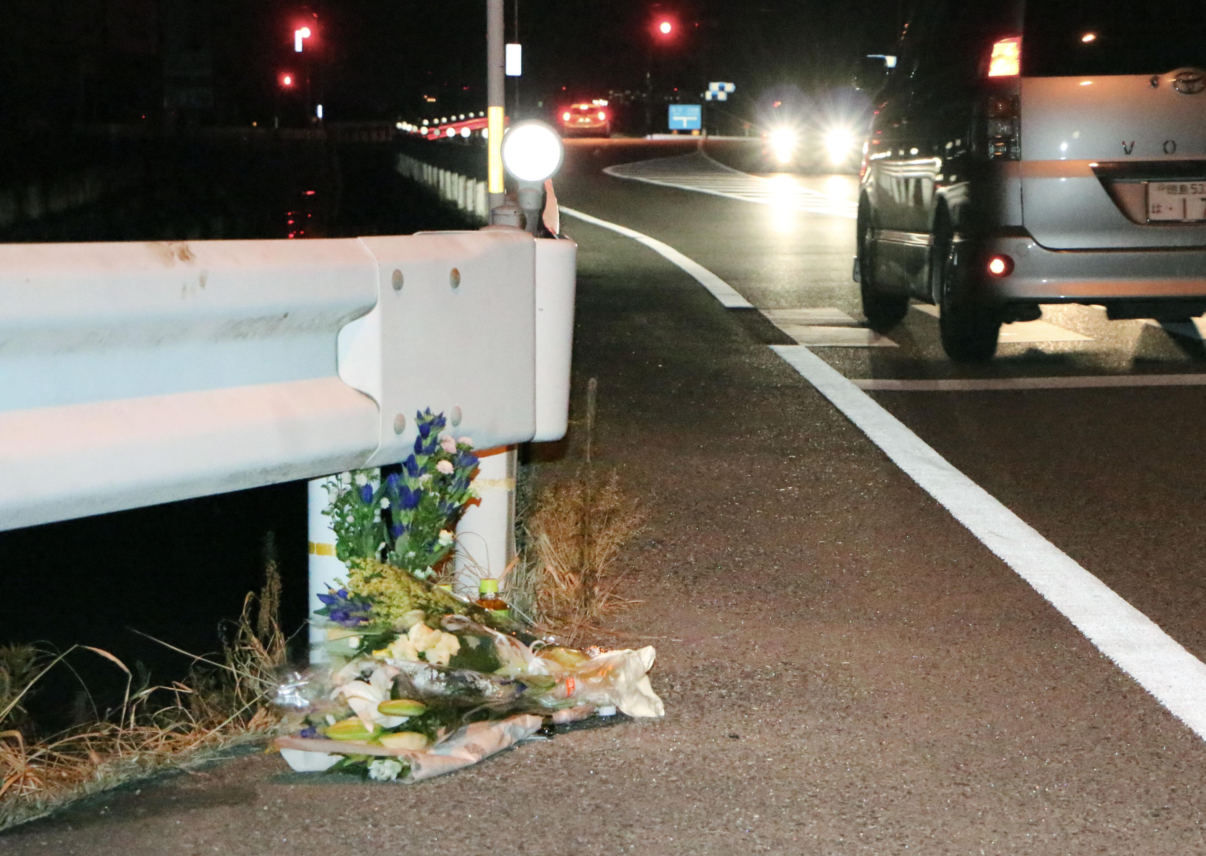 Flowers are laid in Tokushima, Japan, on Aug. 24, 2016, near the scene where a passer-by was killed in the first fatal accident in the country linked to a person playing the popular augmented-reality game "Pokemon Go" while driving. (Kyodo—Kyodo/AP)