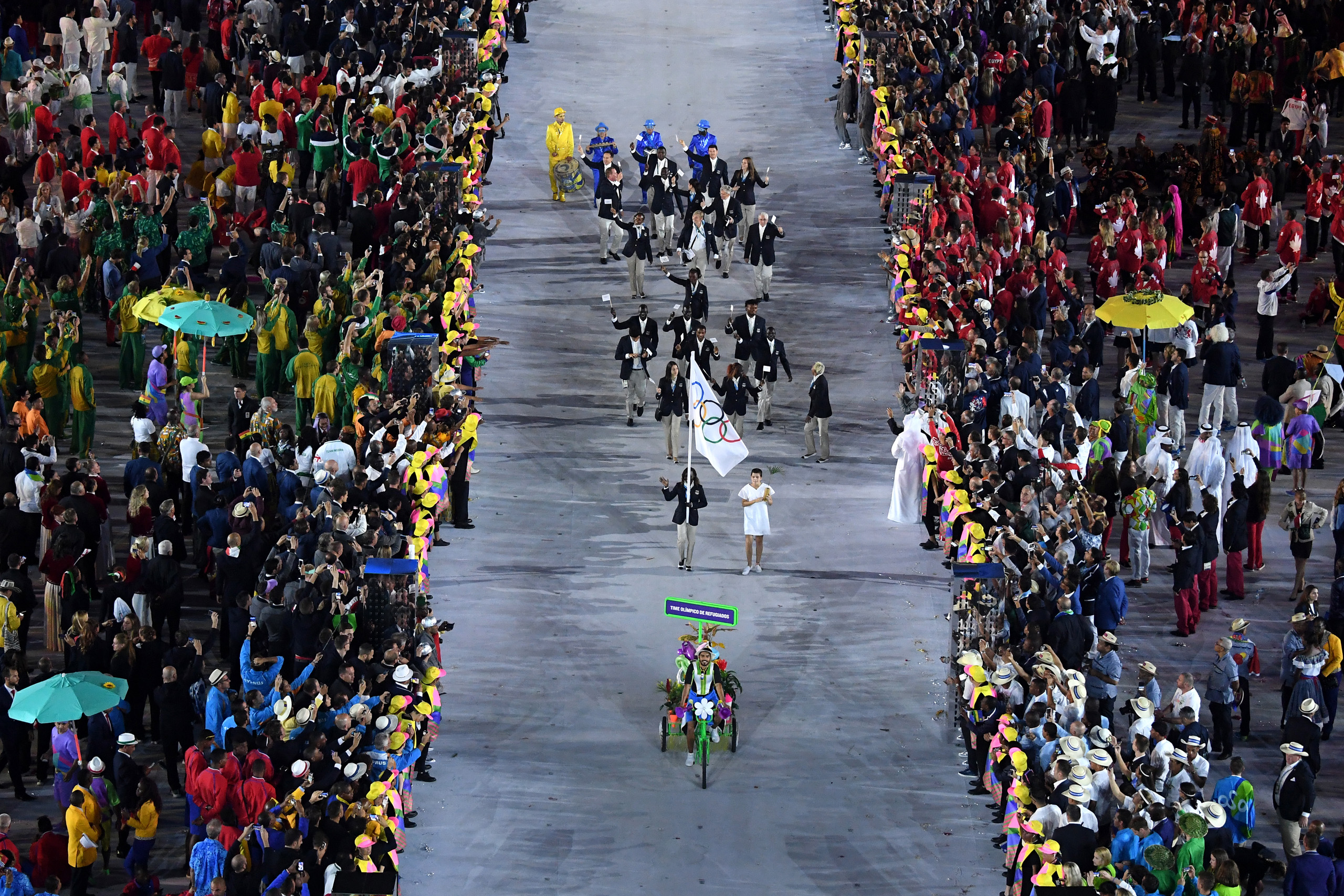 The Olympic Refugee team enter the atheletes parade during the Opening Ceremony of the Rio 2016 Olympic Games at Maracana Stadium in Rio de Janeiro on August 5, 2016. (Richard Heathcote—Getty Images)