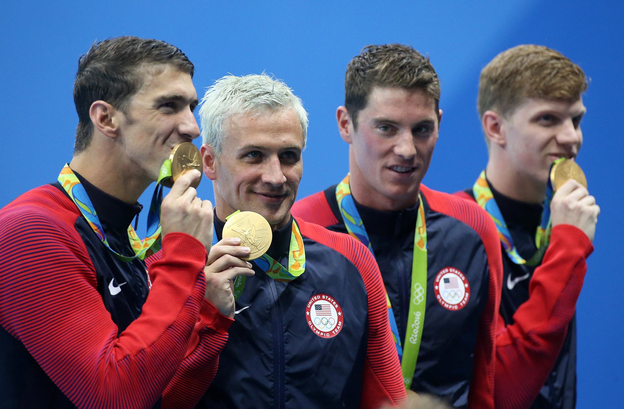 Michael Phelps, Ryan Lochte, Conor Dwyer, Francis Haas of Team USA celebrate winning the gold medal during the medal ceremony of the men's 200m freestyle relay on day 4 of the Rio 2016 Olympic Games at Olympic Aquatics Stadium on August 9, 2016 in Rio de Janeiro, Brazil. (Jean Catuffe-Getty Images)
