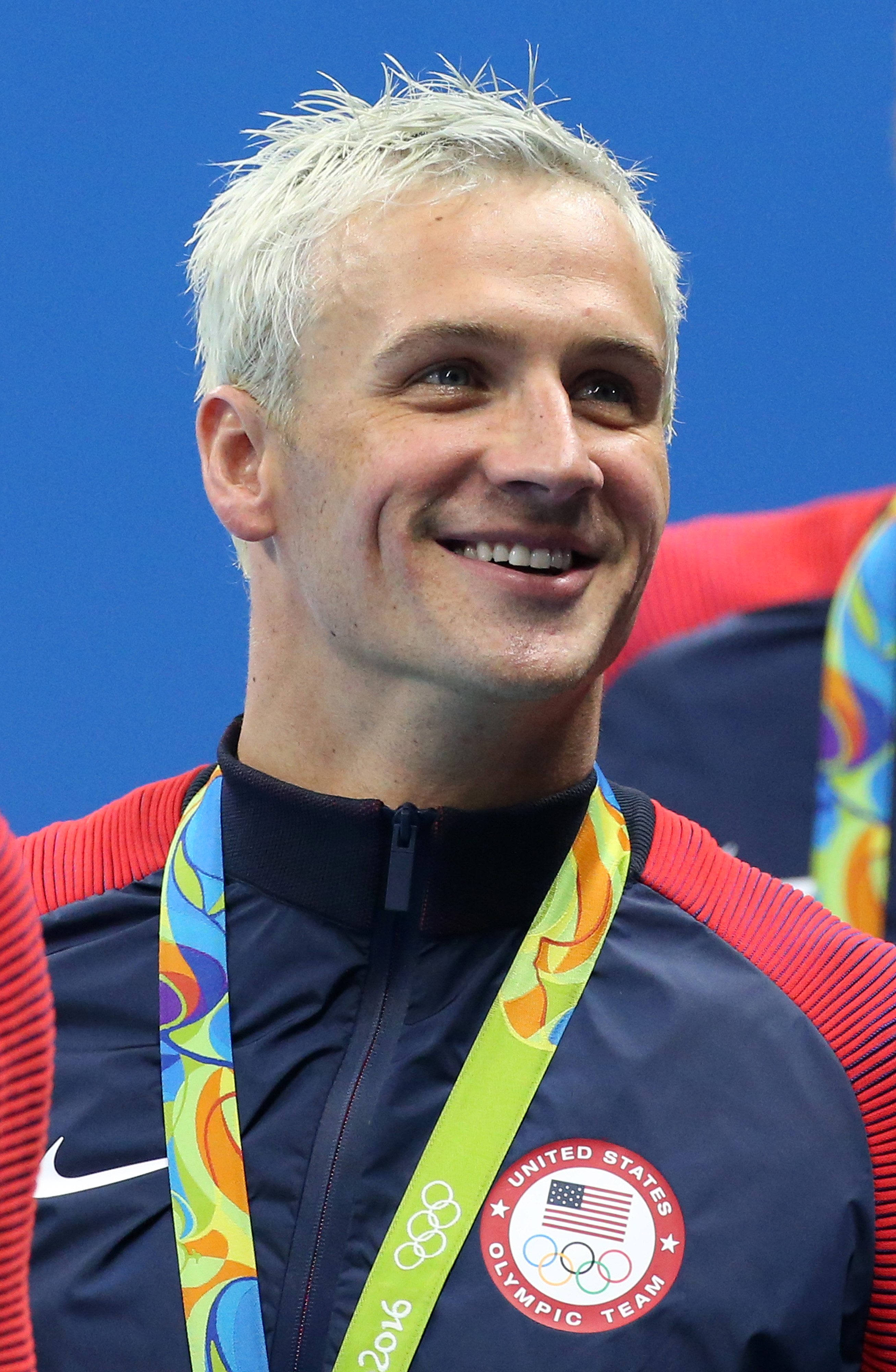 RIO DE JANEIRO, BRAZIL - AUGUST 9: Ryan Lochte of Team USA celebrates winning the gold medal during the medal ceremony of the men's 200m freestyle relay on day 4 of the Rio 2016 Olympic Games at Olympic Aquatics Stadium on August 9, 2016 in Rio de Janeiro, Brazil. (Photo by Jean Catuffe/Getty Images)