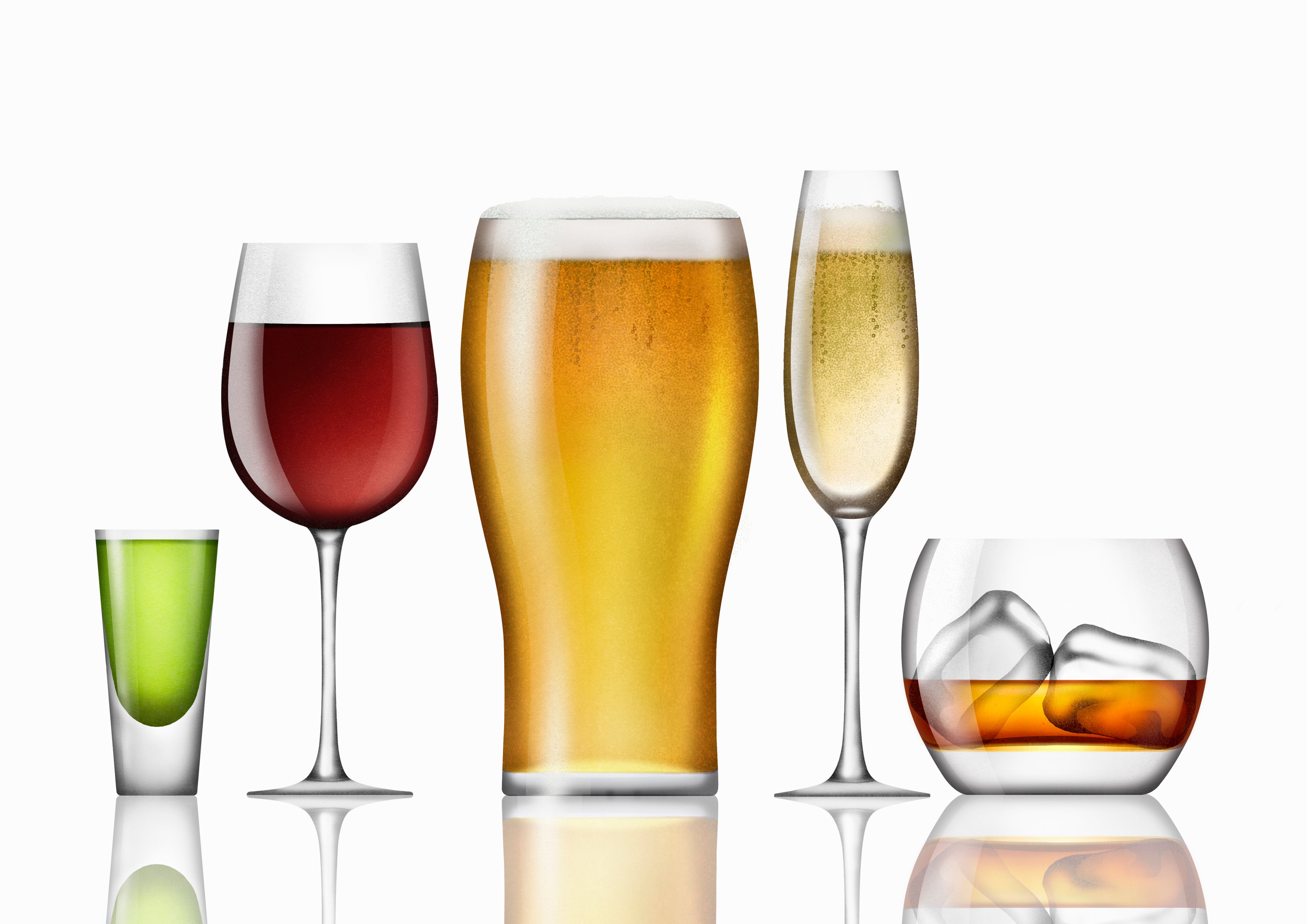 Range of different alcoholic drinks in a row (Nick Purser—Getty Images/Ikon Images)