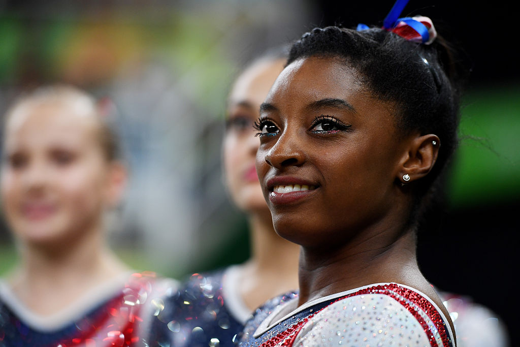 Simone Biles of the United States looks on during the Artistic Gymnastics Women's Team Final on Day 4 of the Rio 2016 Olympic Games at the Rio Olympic Arena on August 9, 2016 in Rio de Janeiro, Brazil. (Laurence Griffiths/Getty Images)