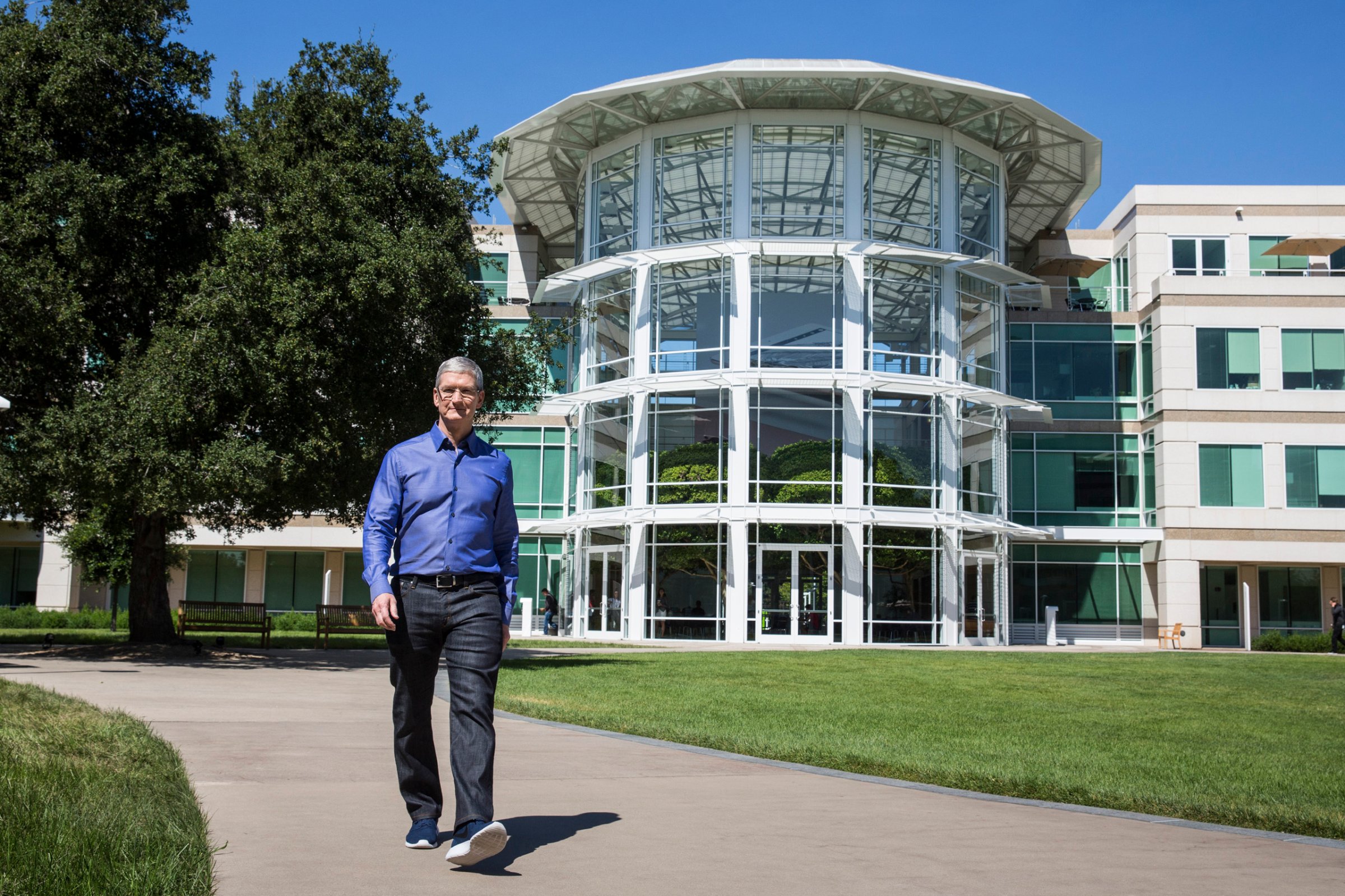 Apple CEO Tim Cook walks through Apple's global headquarters during a photo shoot in Cupertino, Calif. on July 28, 2016.