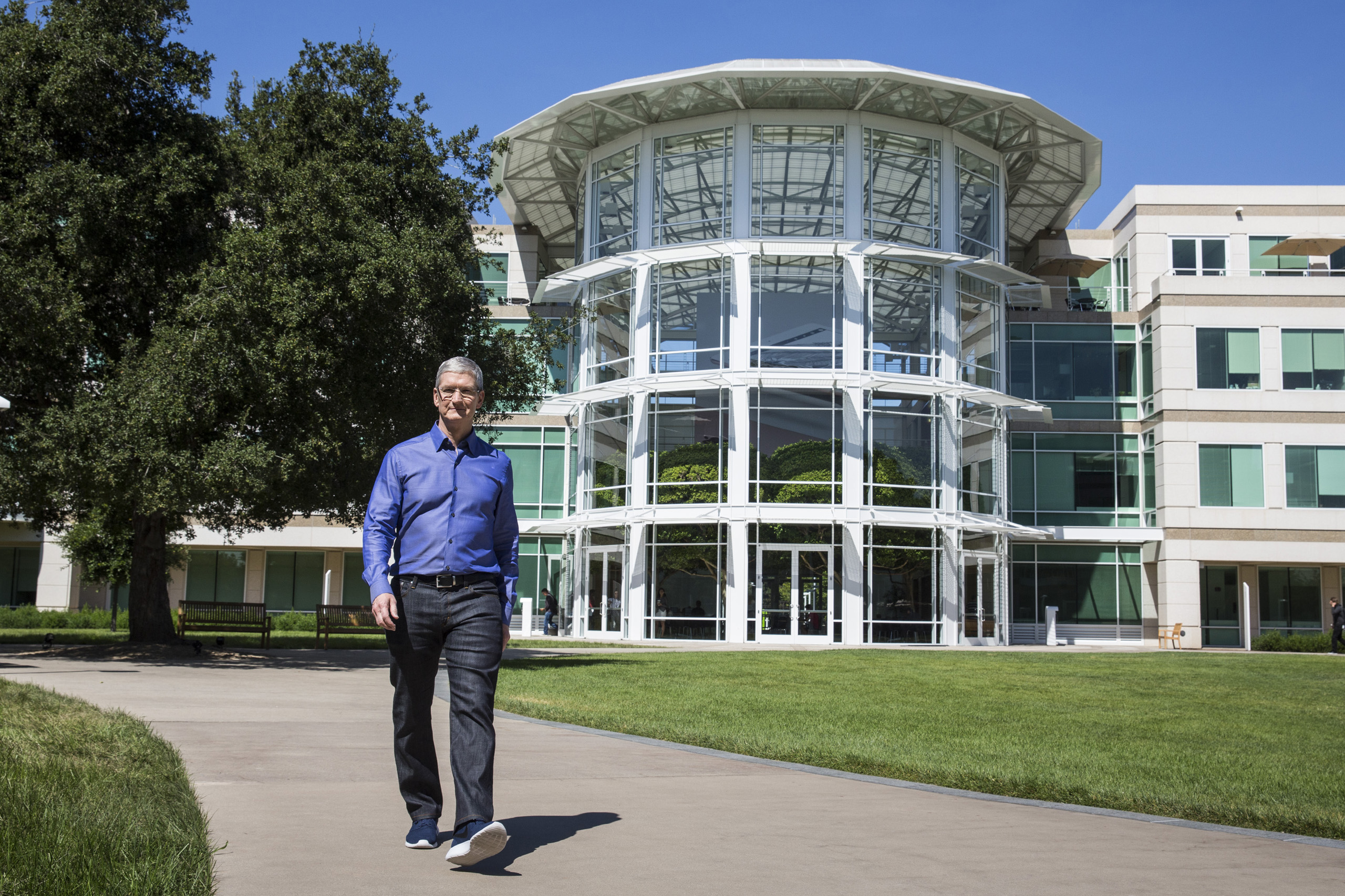 Apple CEO Tim Cook walks through Apple's global headquarters during a photo shoot in Cupertino, Calif. on July 28, 2016. (Andrew Burton—The Washington Post/Getty Images)