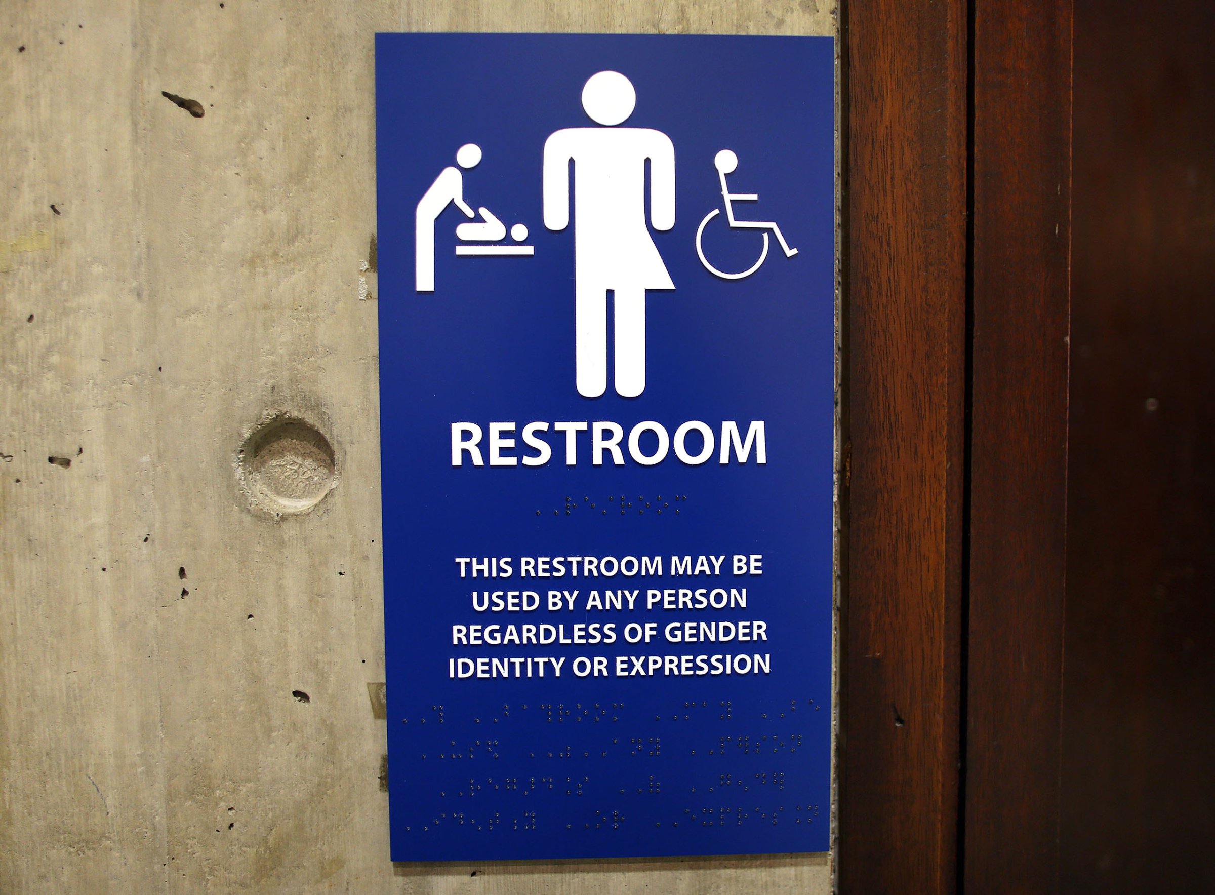 The sign for the gender-neutral bathrooms on the 5th floor of Boston City Hall across from the reception area for the Mayor's office, May 15, 2016.
