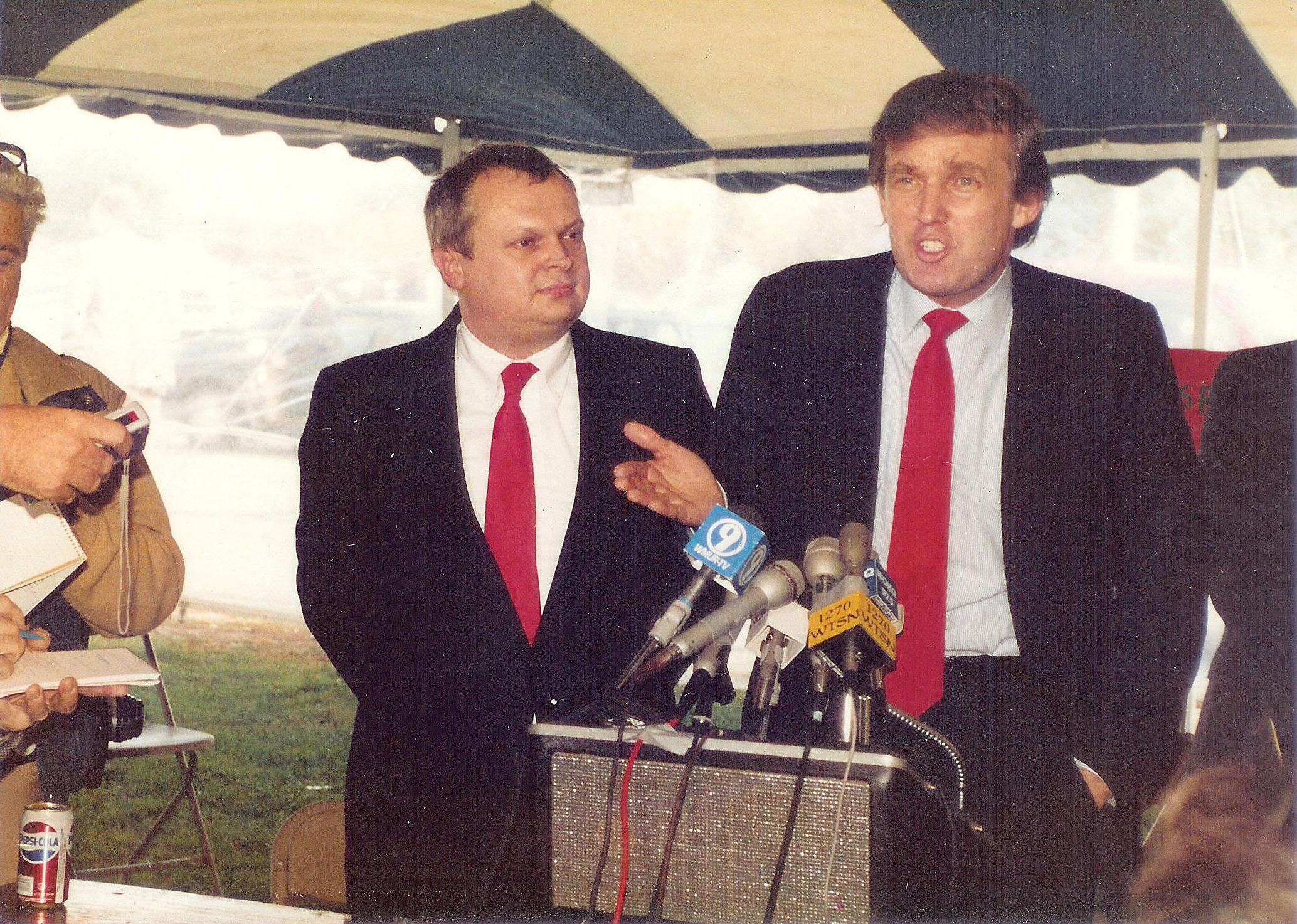 Donald Trump (right) stands beside Mike Dunbar as he speaks at a press conference in Portsmouth, N.H., on Oct. 22, 1987. (Courtesy of Mike Dunbar)