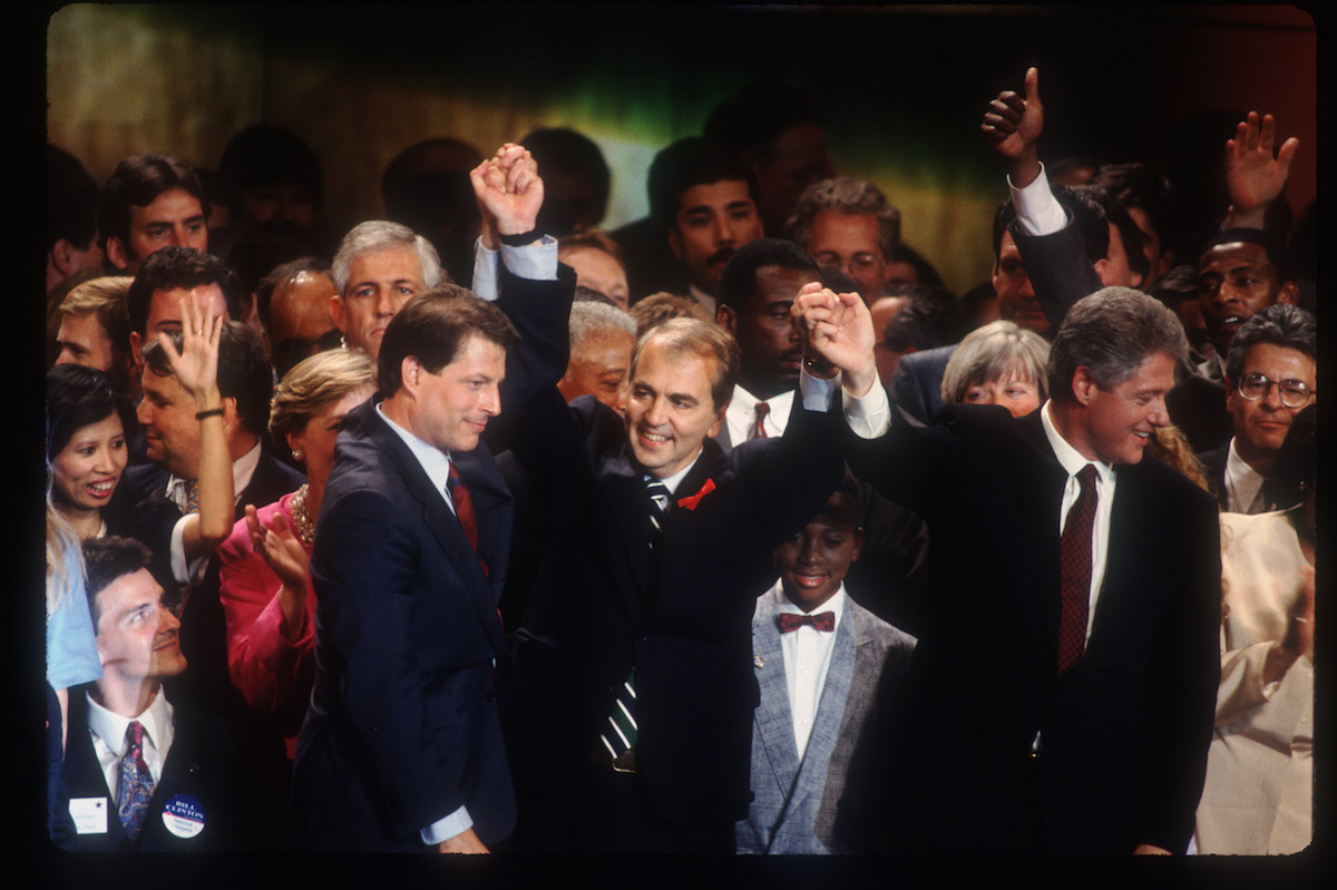 Former senator Paul Tsongas lifts Bill Clinton's and Al Gore's hands July 16, 1992 at the Democratic National Convention in New York City after the Democratic Party nominated Clinton and Gore over Tsongas. (Joe Traver—Liason/Getty Images)