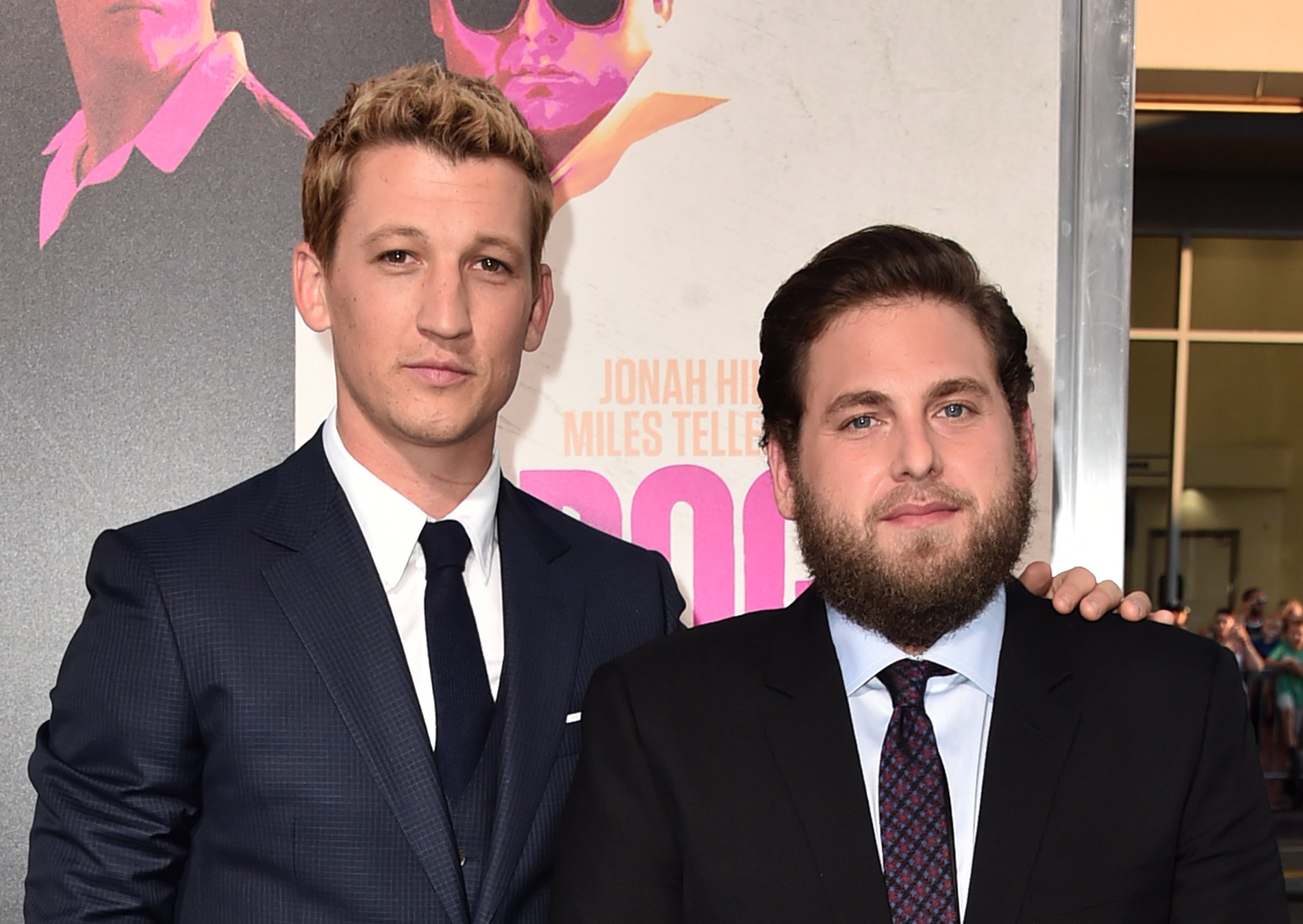 Actors Miles Teller (L) and Jonah Hill attend the premiere of Warner Bros. Pictures' "War Dogs" at TCL Chinese Theatre on August 15, 2016 in Hollywood, California.