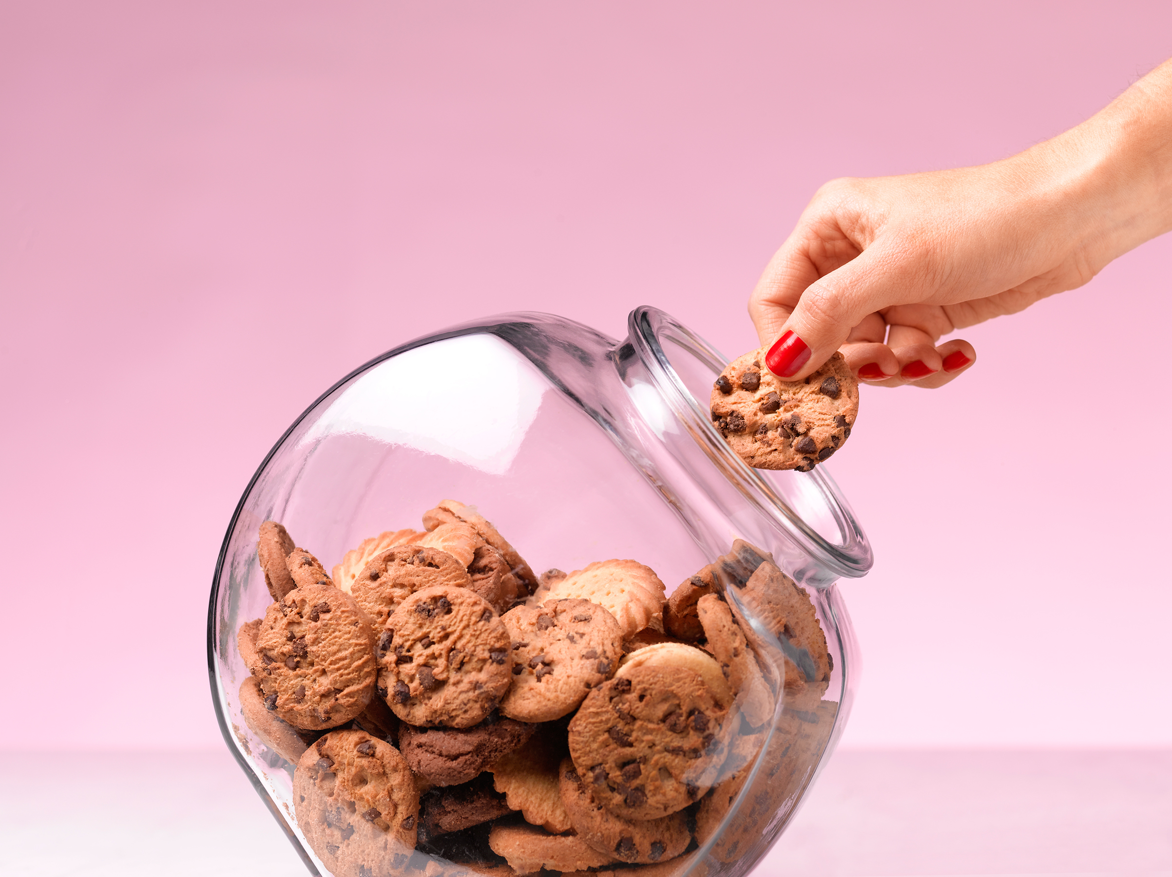 Temptation - hand in a cookie jar