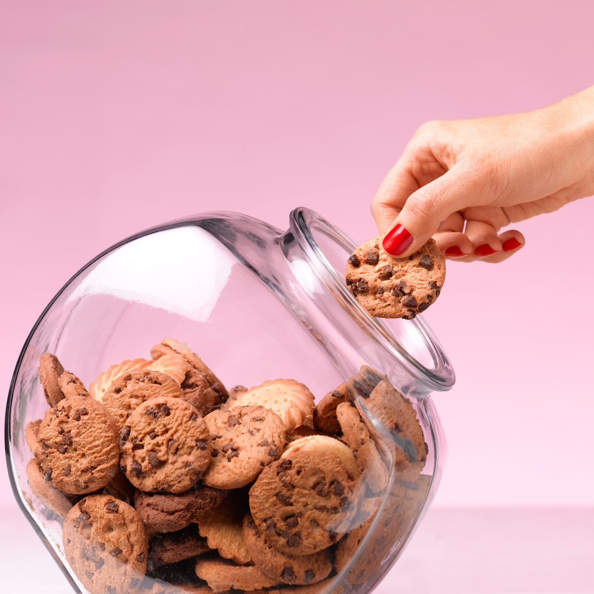 Temptation - hand in a cookie jar