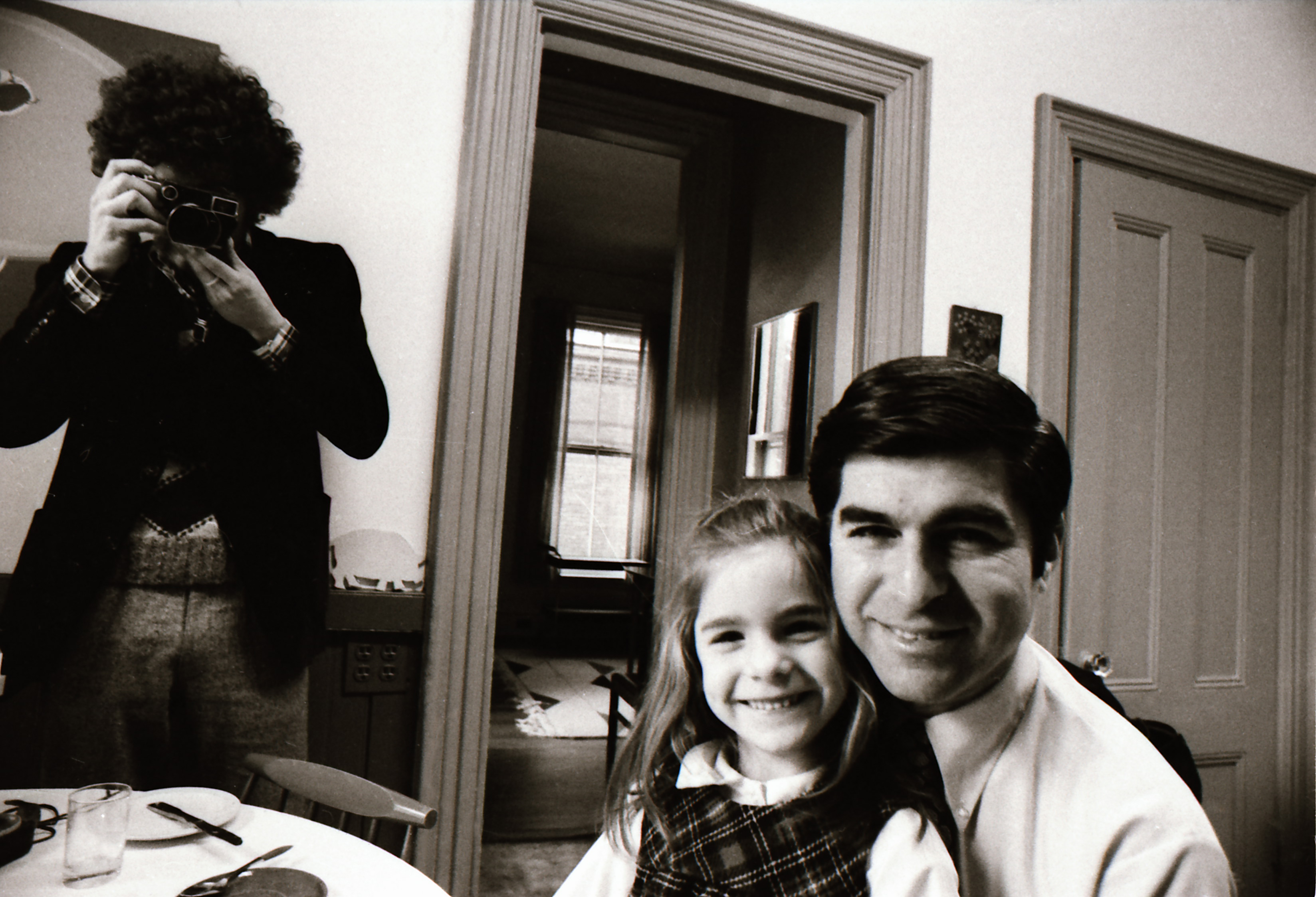 Michael Dukakis sitting with his daughter, Brookline, Massachusetts, 1976.