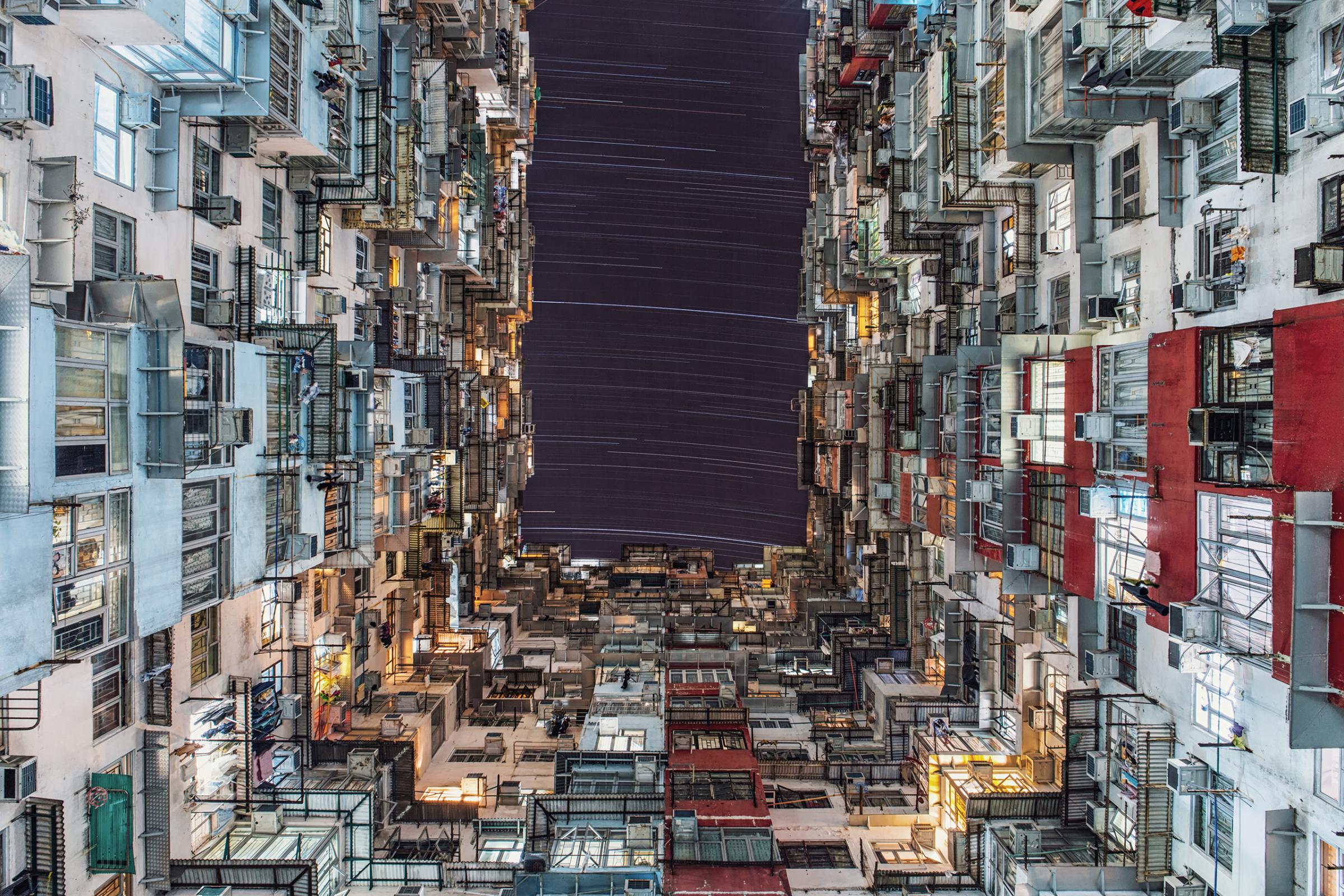 People and Space:Wing Ka Ho took this photo in Quarry Bay, Hong Kong. Due to light pollution from the city's many lights and neon signs, "only a few stars can be seen regularly... on some of the clearest evenings," he writes.