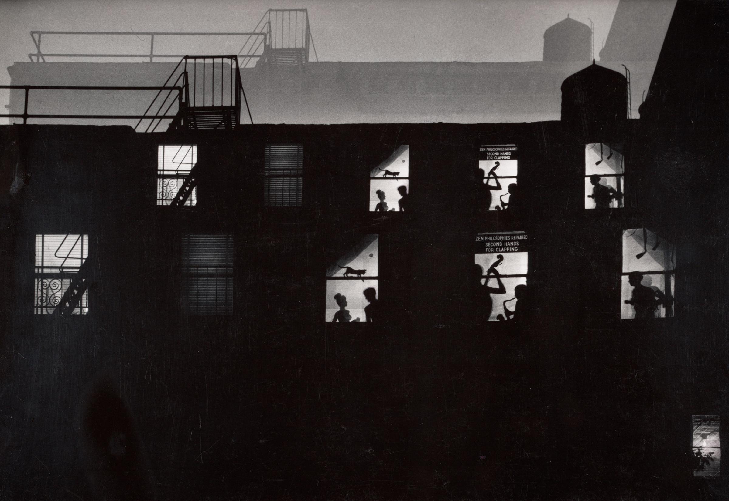 An experimental loft photo with added cut-out silhouettes in the windows.