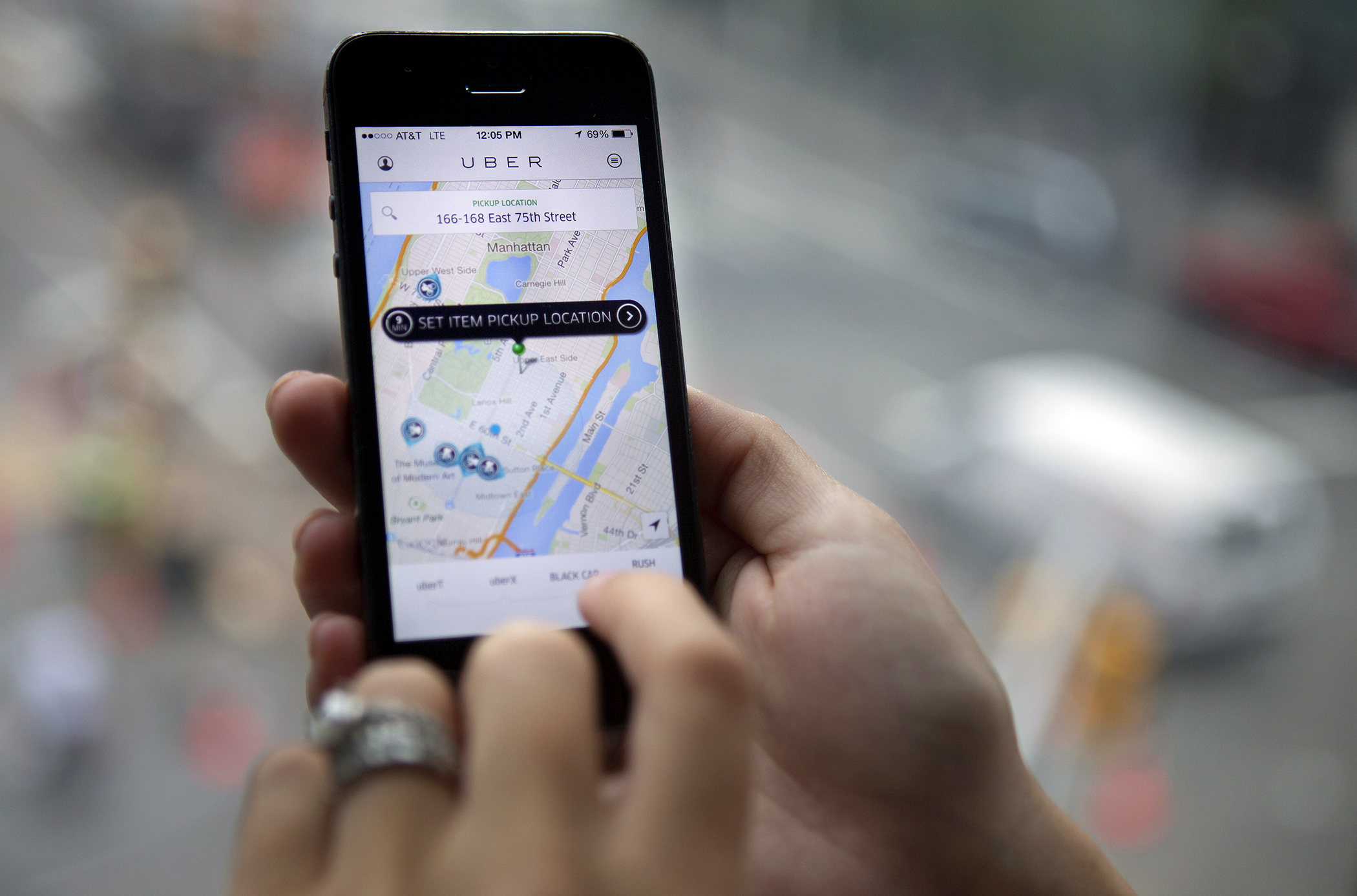 The Uber Technologies Inc. car service application (app) is demonstrated for a photograph on an Apple Inc. iPhone in New York, on Wednesday, Aug. 6, 2014. (Victor J. Blue&mdash;Bloomberg via Getty Images)