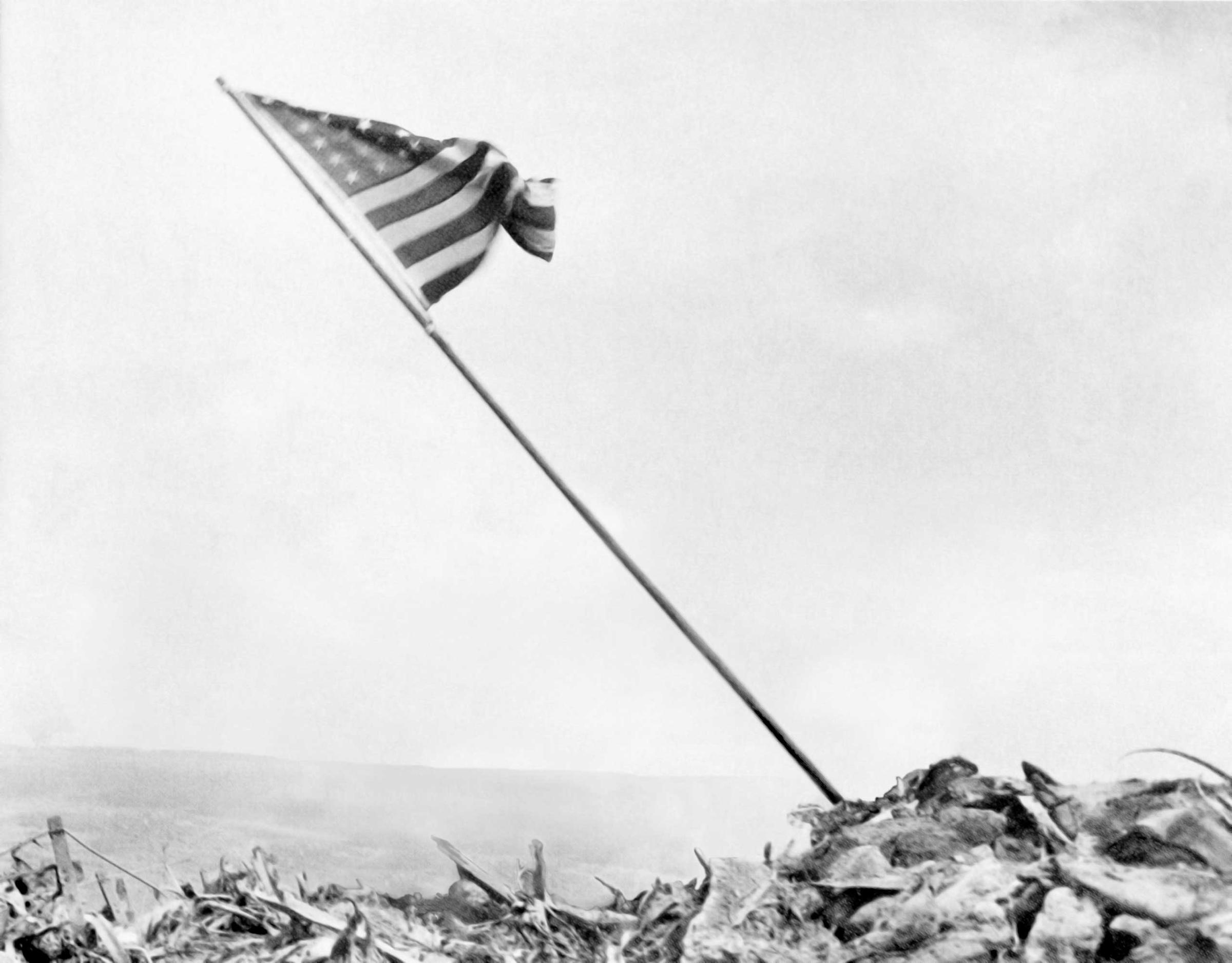 Members of the United States Marine Corps raise the American flag on Mount Suribachi on February 23, 1945 after the Battle of Iwo Jima, one of the most costly battles of the Pacific campaign during World War II. More than 6,000 United States Marines fell during the capture of the island.