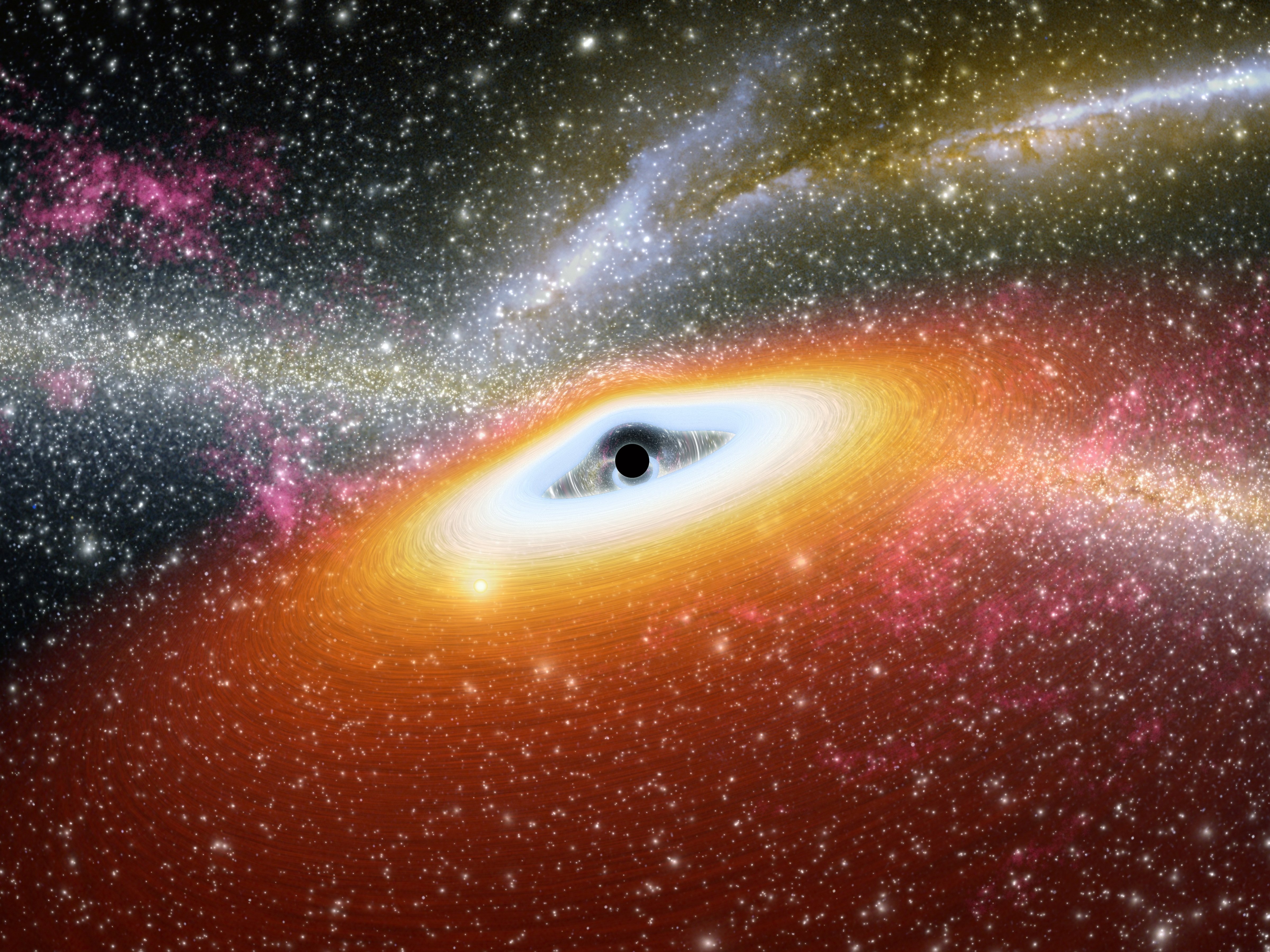 No escape: Artist's conception of a supermassive black hole at the core of a young, star-rich galaxy.