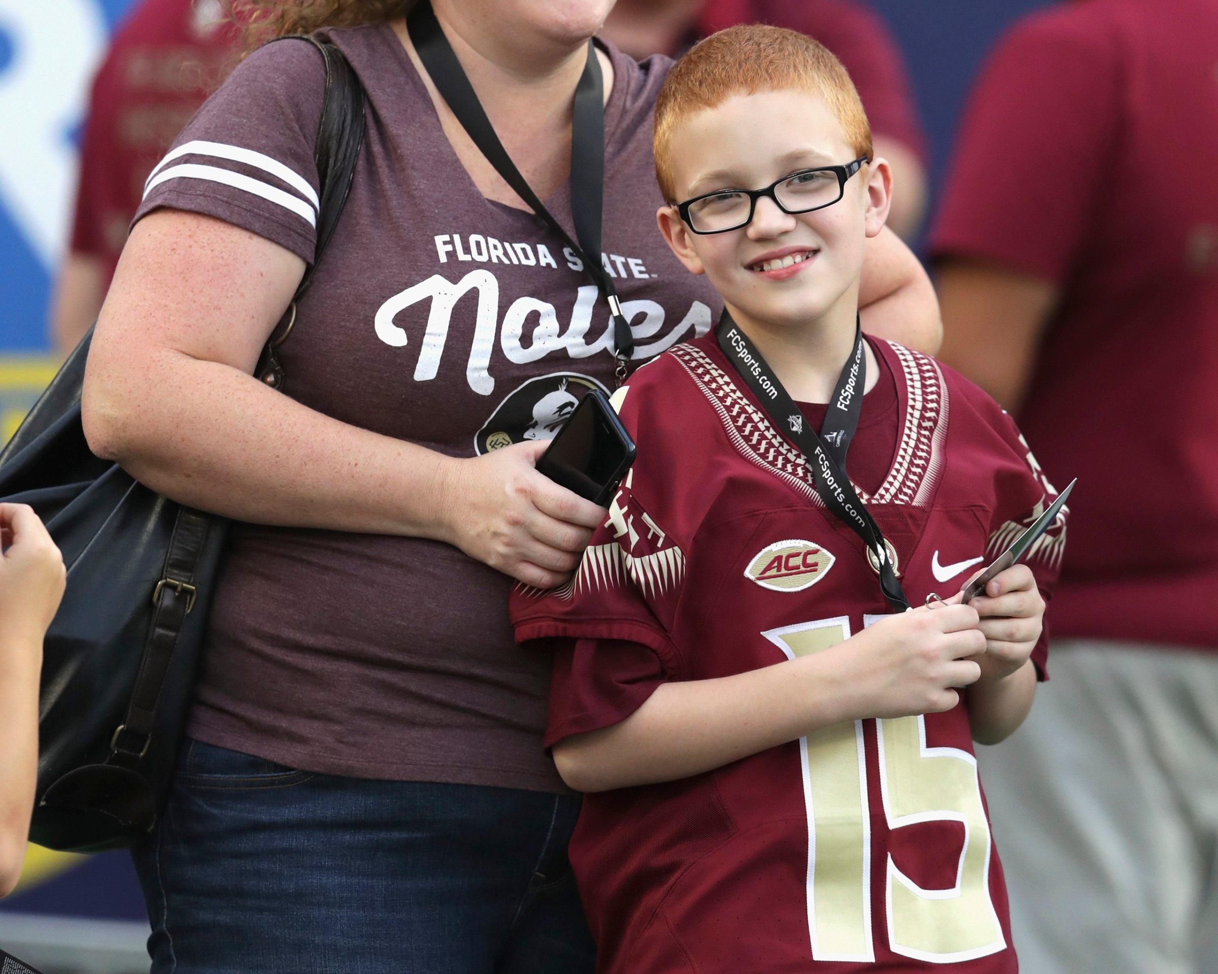Bo Paske and mother Leah Paske are seen on the sideline prior to the Camping World Kickoff between the Florida State Seminoles and the Mississippi Rebels at Camping World Stadium in Orlando on Sept. 5, 2016.