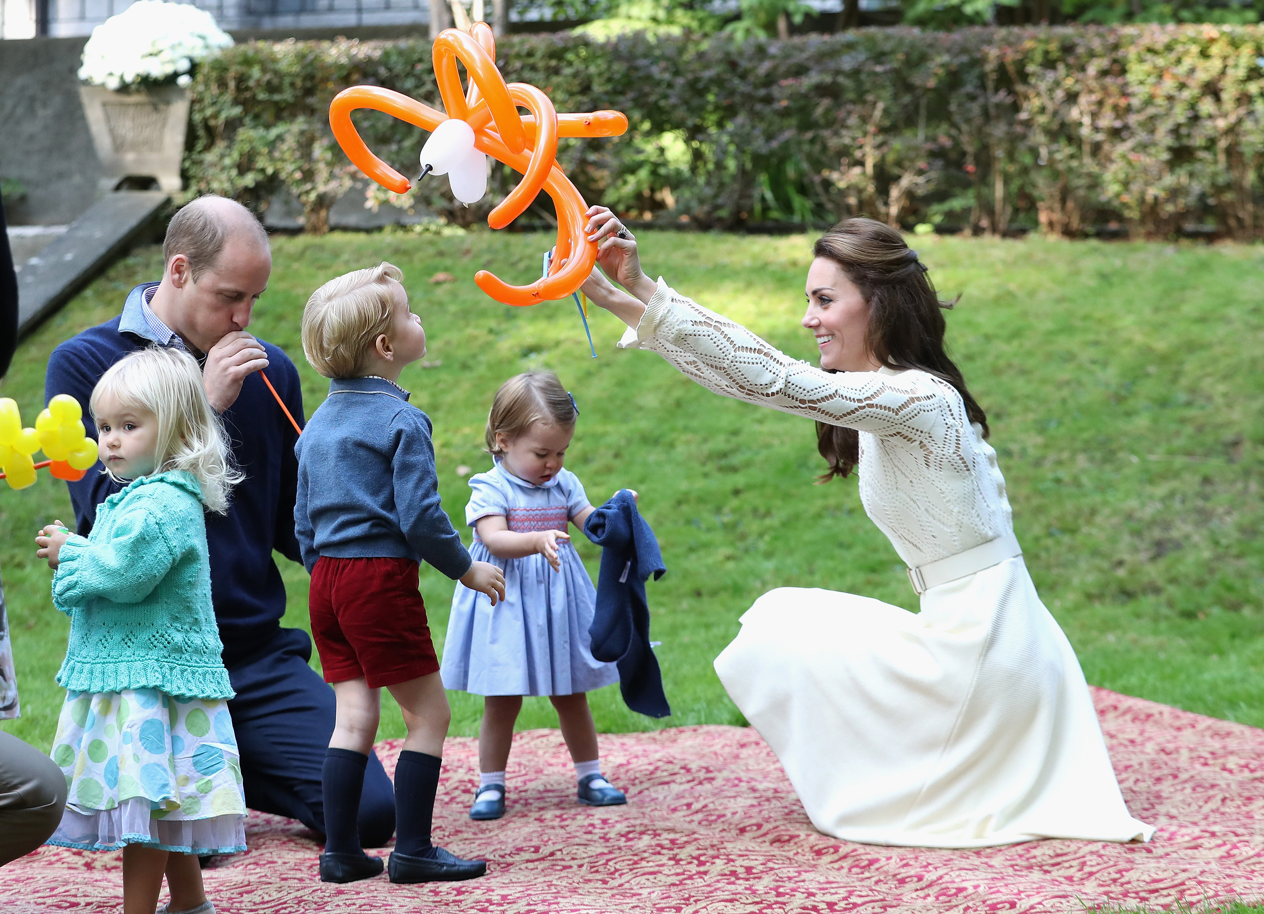 Catherine, Duchess of Cambridge, Princess Charlotte of Cambridge and Prince George of Cambridge at a children's party for Military families  in Victoria, Canada, on Sept. 29, 2016.