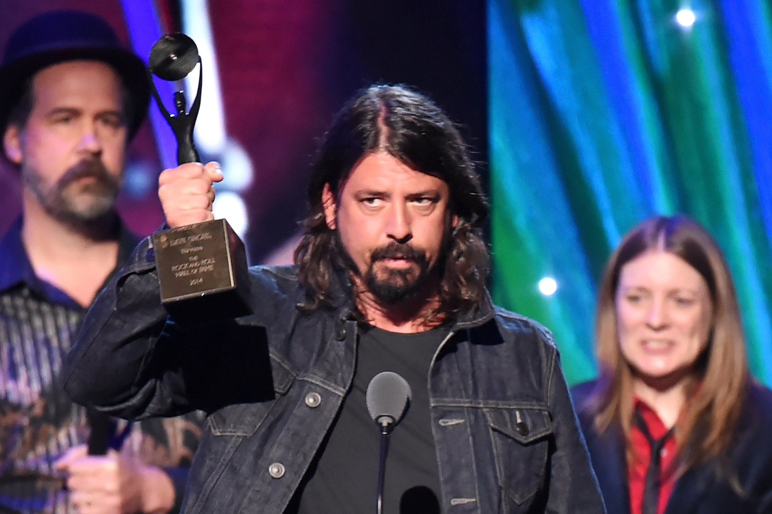 From left: Krist Novoselic, Dave Grohl and Kimberly Cobain at the 29th Annual Rock And Roll Hall Of Fame Induction Ceremony, on April 10, 2014 in Brooklyn, N.Y.