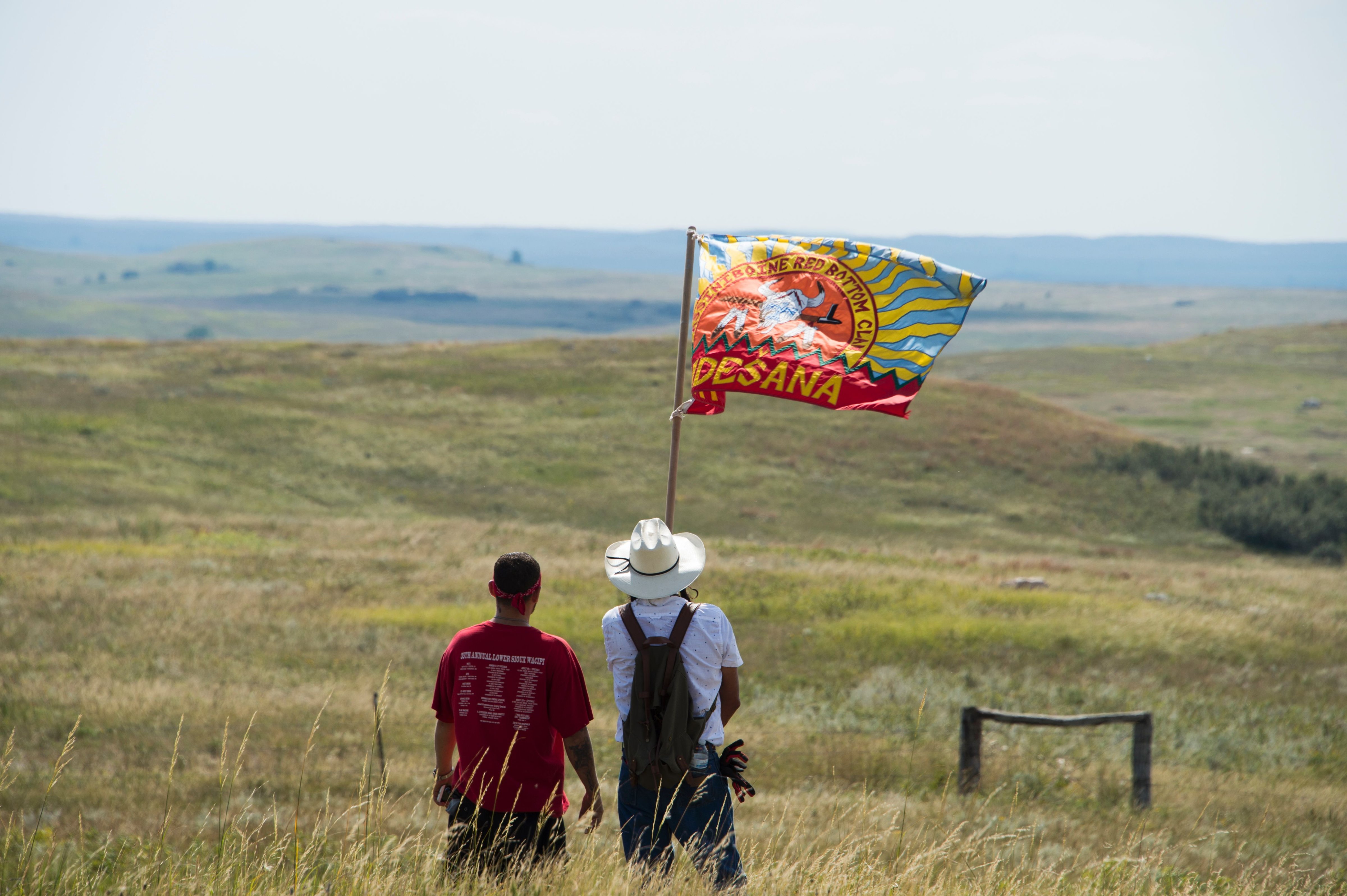 Native American protestors wave a clan flag over land designated for the Dakota Access Pipeline, on  September 3, 2016, near Cannon Ball, North Dakota. (ROBYN BECK—AFP/Getty Images)