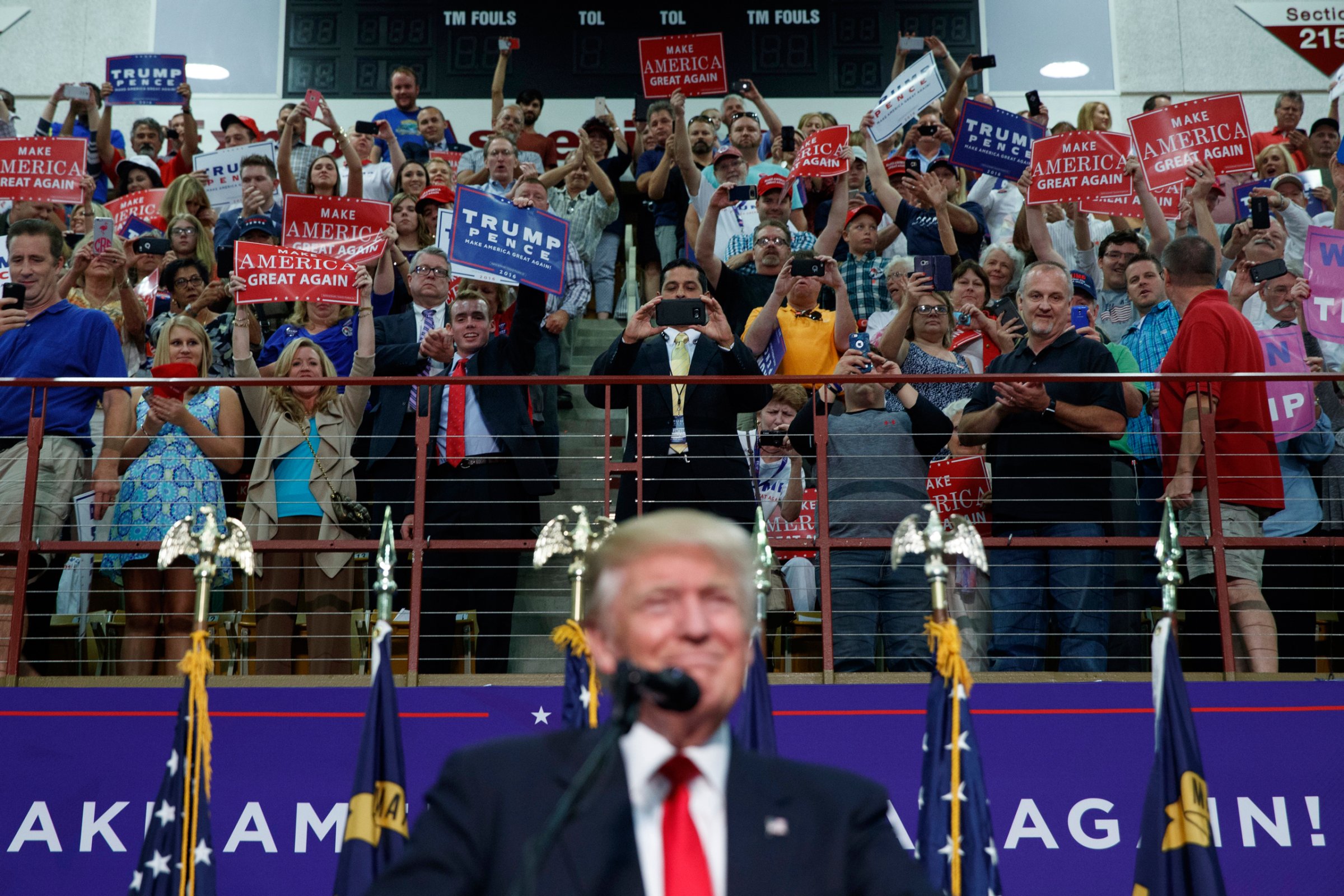 Supporters of Republican presidential candidate Donald Trump cheer as he speaks during a rally, Monday, Sept. 12, 2016, in Asheville, N.C. (AP Photo/Evan Vucci)