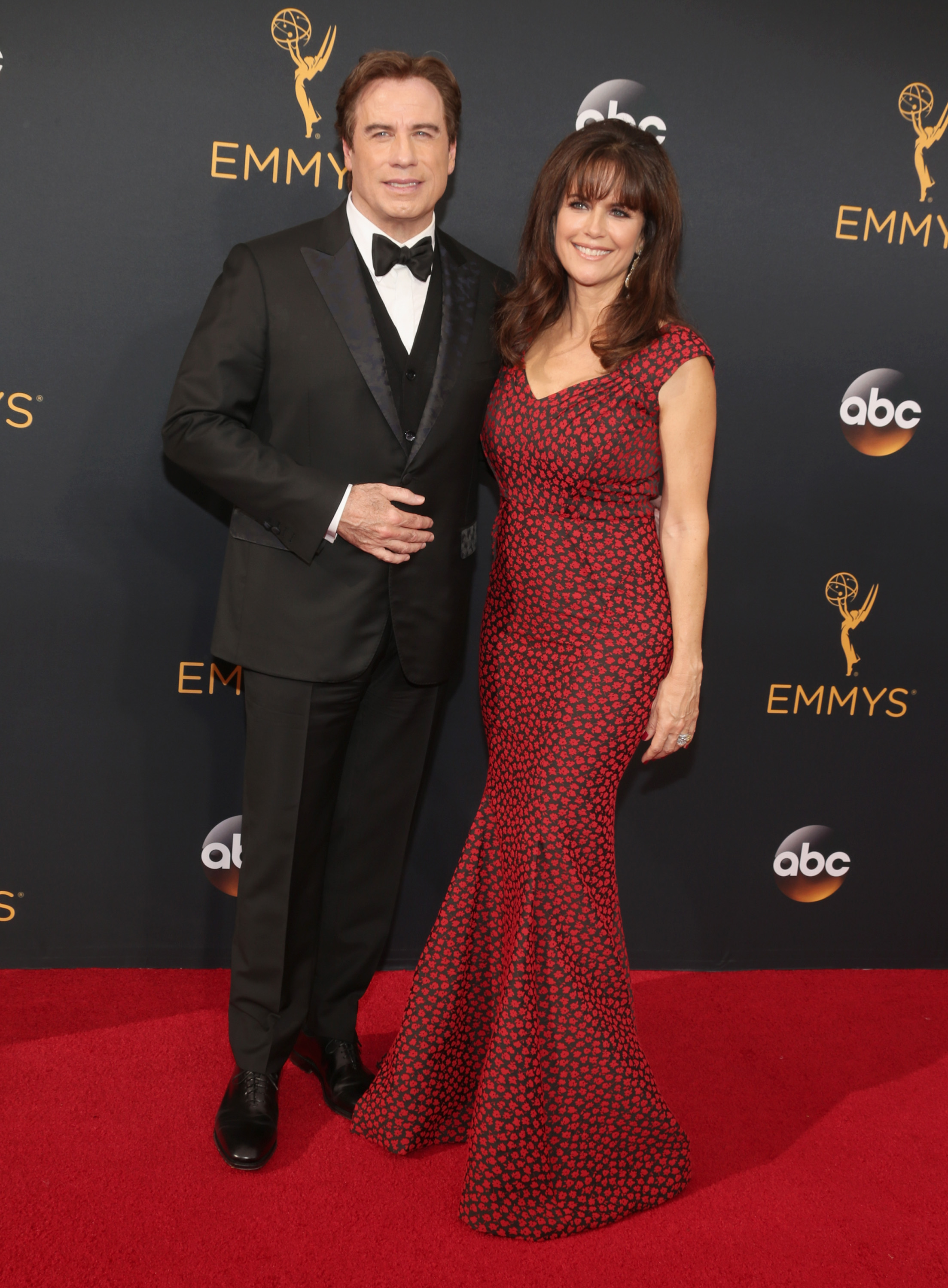 John Travolta and Kelly Preston arrive at the 68th Annual Primetime Emmy Awards at Microsoft Theater on September 18, 2016 in Los Angeles.