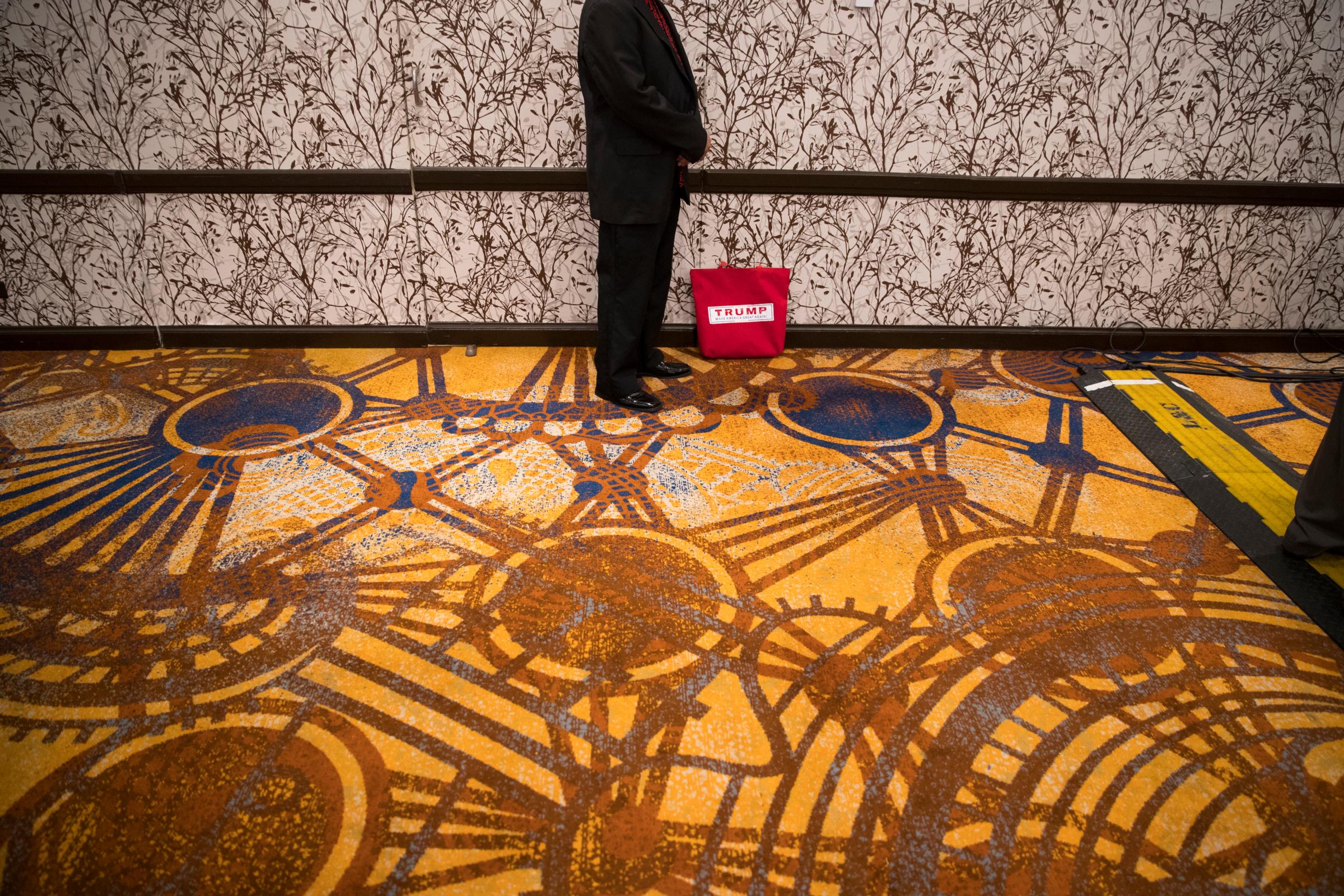 Nathan Paikai, of Honolulu, waits for the arrival of Republican presidential candidate Donald Trump at a reception with friends and family following the Republican National Convention, July 22, 2016, in Cleveland.