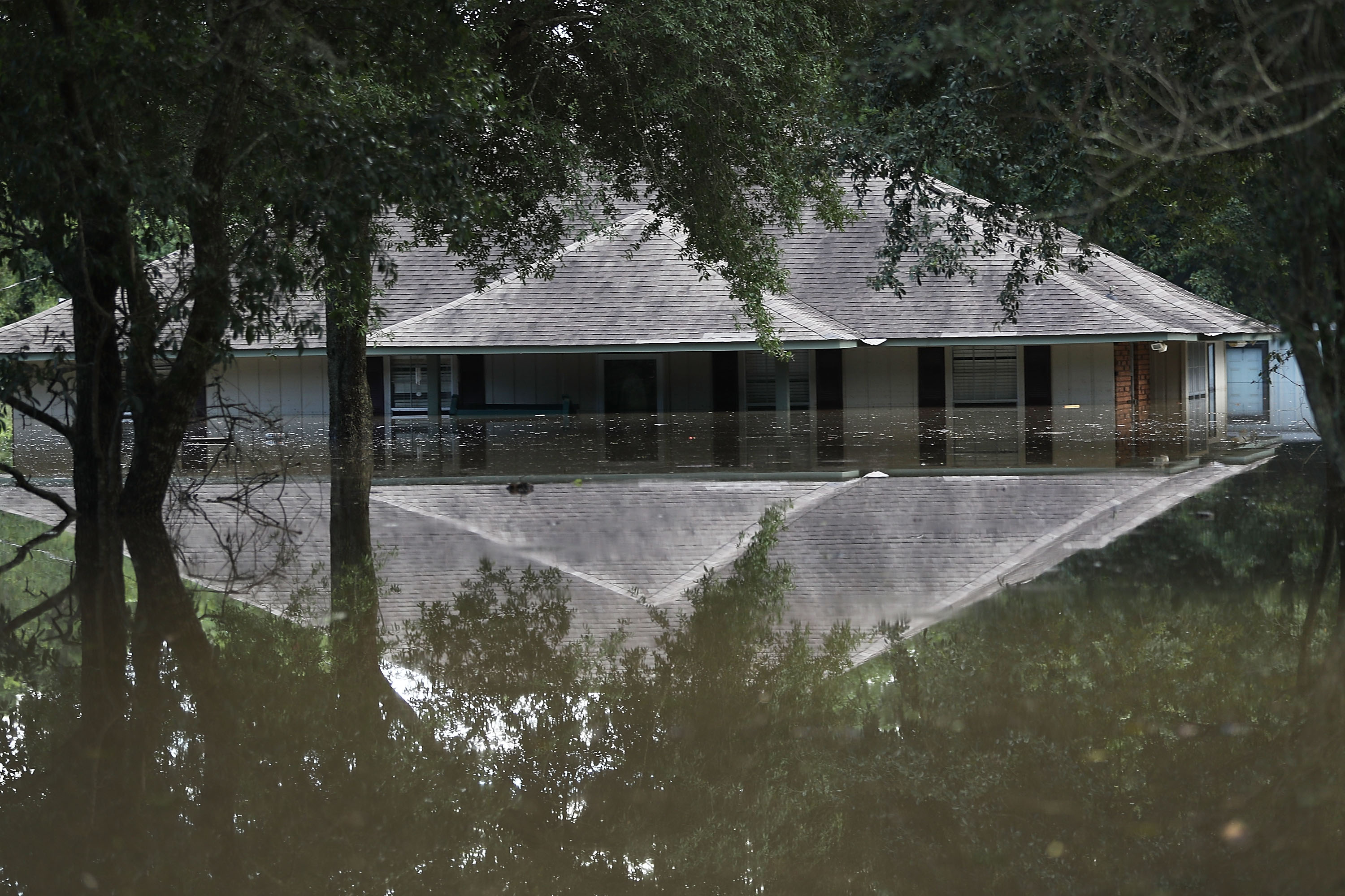 A flooded home is seen on Aug. 15, 2016 in Baton Rouge, Louisiana. (Joe Raedle—Getty Images)
