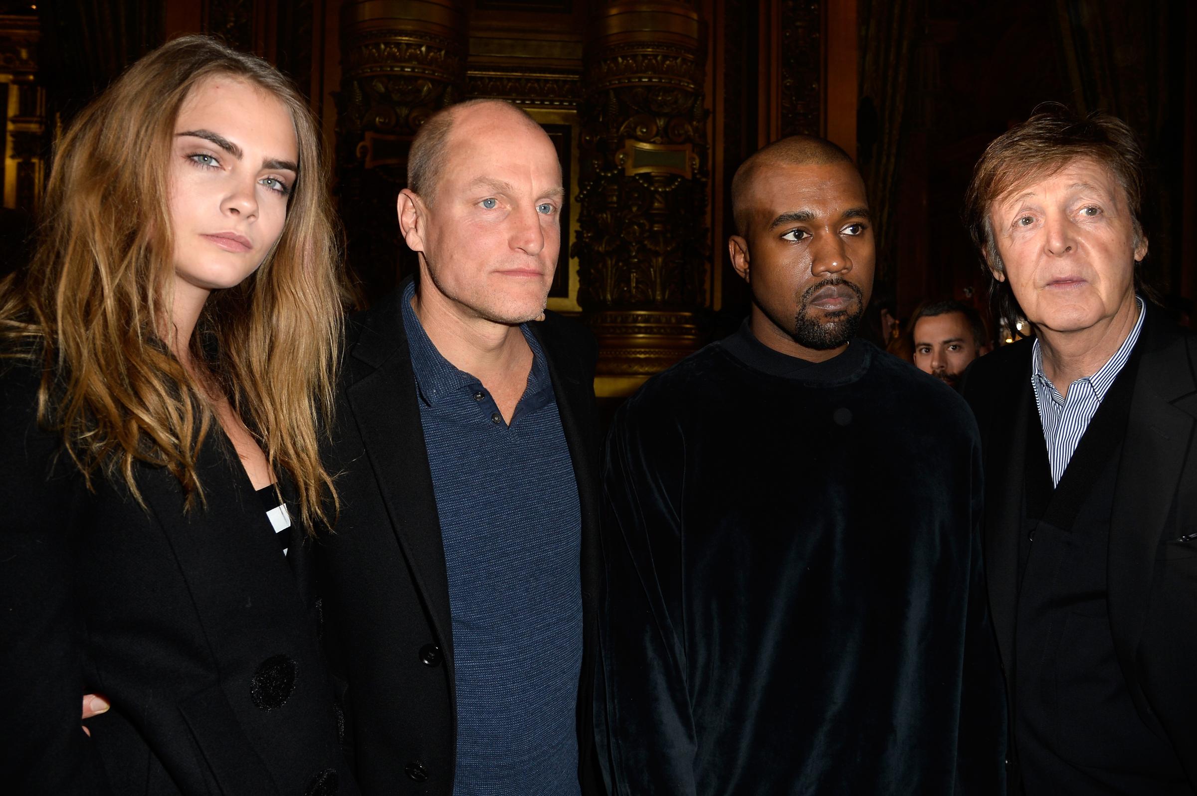 Cara Delevingne, Woody Harrelson, Kanye West and Paul McCartney at the Stella McCartney Fall/Winter 2015 fashion show.