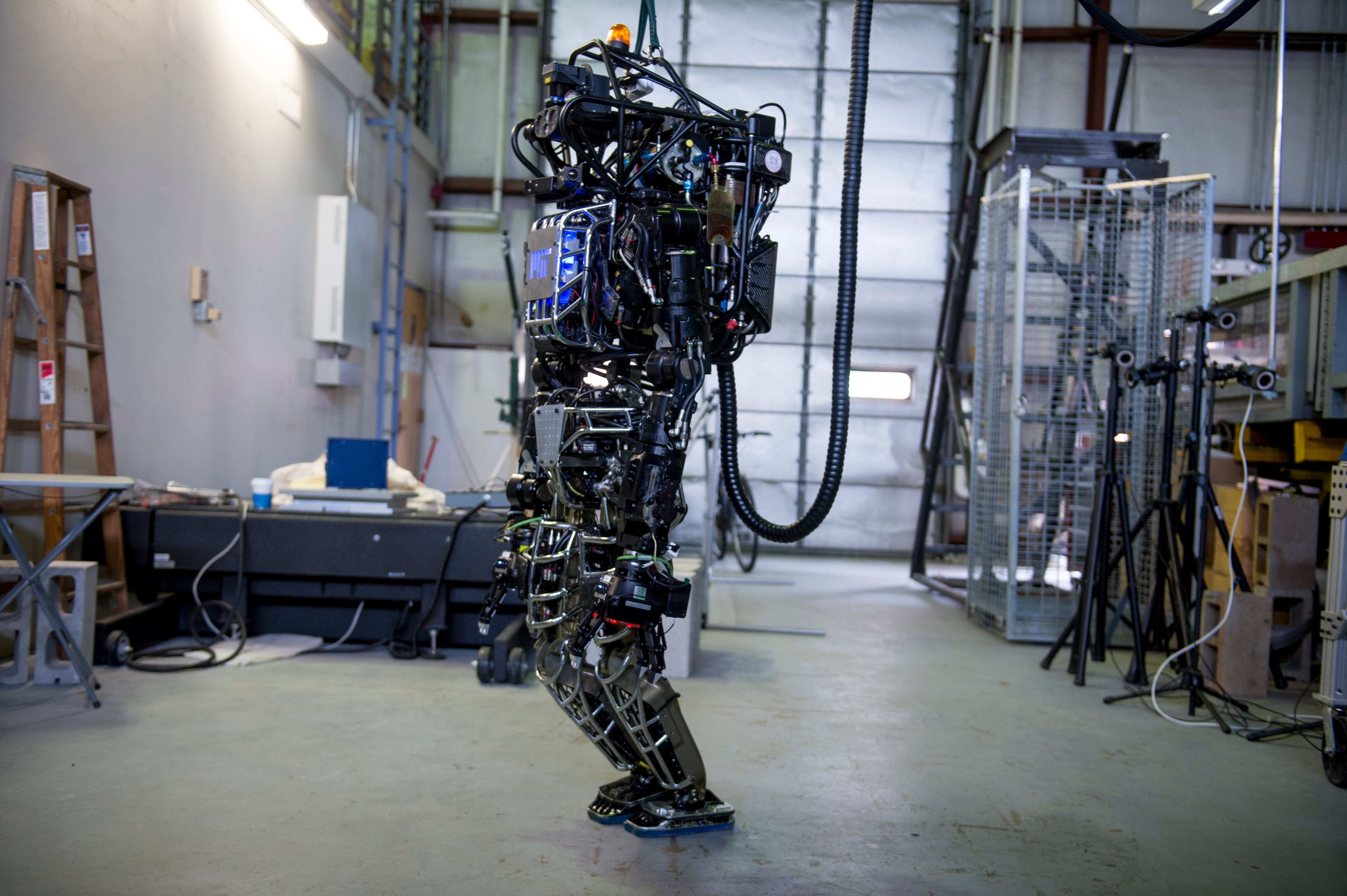 The capabilities of the Atlas robot are demonstrated during the Massachusetts Institute of Technology's Computer Science and Artificial Intelligence Laboratory's Demo Day on April 6, 2013 in Boston, Massachusetts. (Christian Science Monitor—Christian Science Monitor/Getty Images)