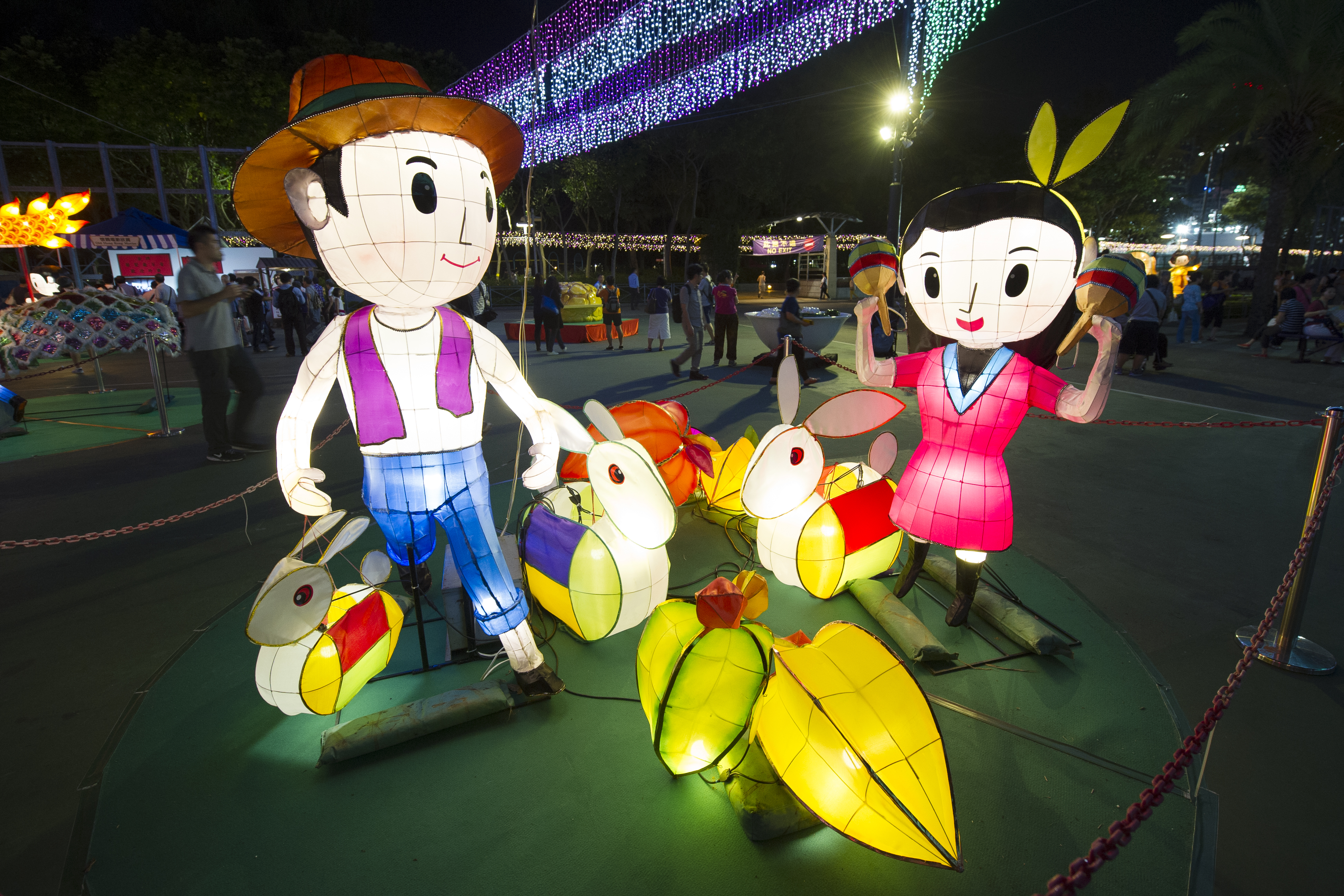 Light decorations are displayed as mid-autumn celebrations take place at dusk on Sept. 24, 2015, in Victoria Park in Hong Kong (Lucas Schifres—Getty Images)
