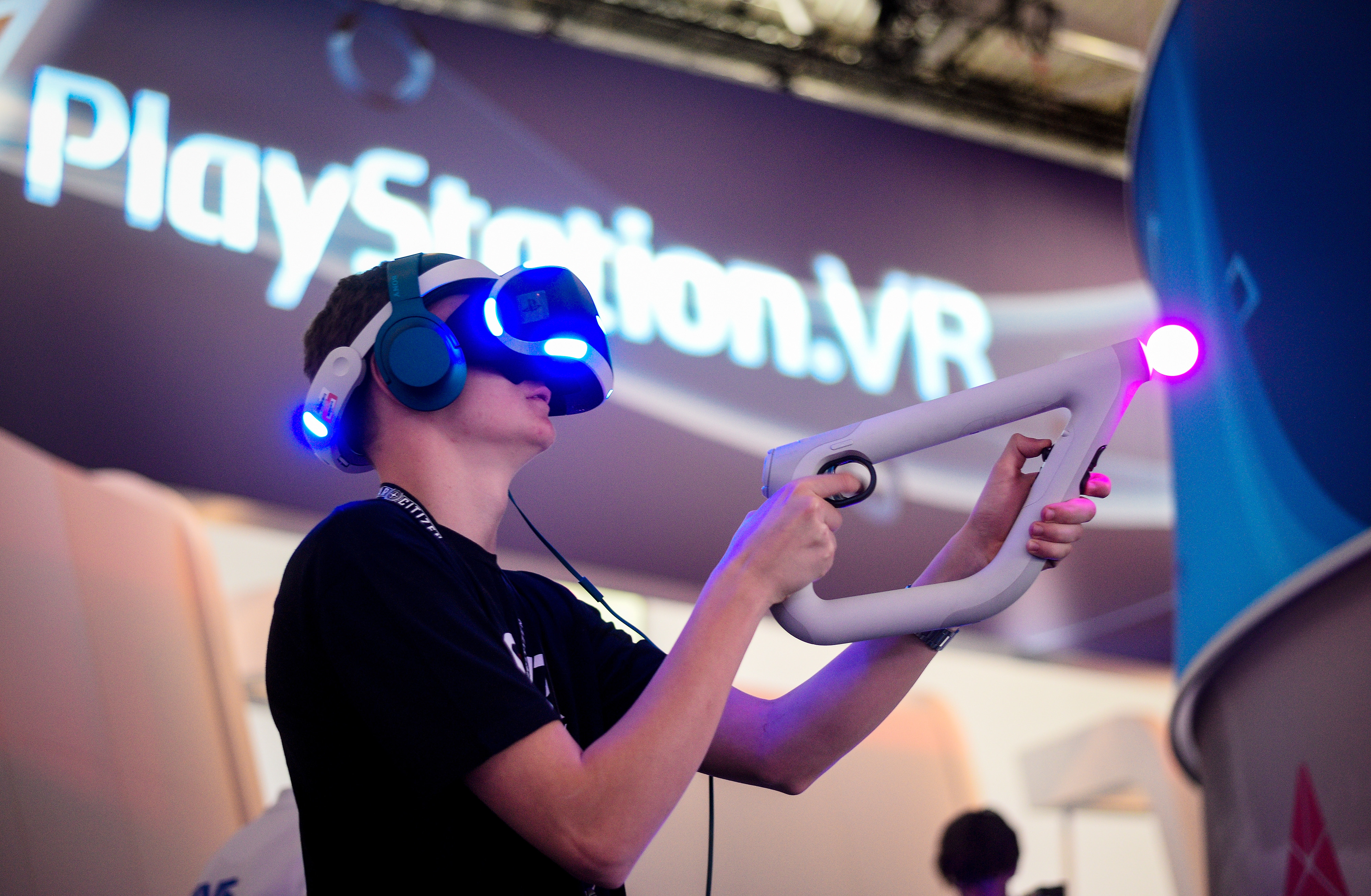 A Visitor try out a VR game at the Sony Play Station stand at the Gamescom 2016 gaming trade fair during the media day on August 17, 2016 in Cologne, Germany. (Sascha Schuermann—Getty Images)