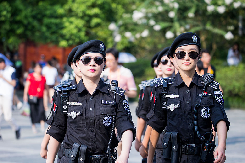 HANGZHOU, CHINA - AUGUST 31: Women police patrol at West Lake resort which will be closed during the G20 Summit on August 31, 2016 in Hangzhou, Zhejiang Province of China. The 2016 Hangzhou G20 Summit will be held in Hangzhou from September 4-5. (Photo by VCG)***_***