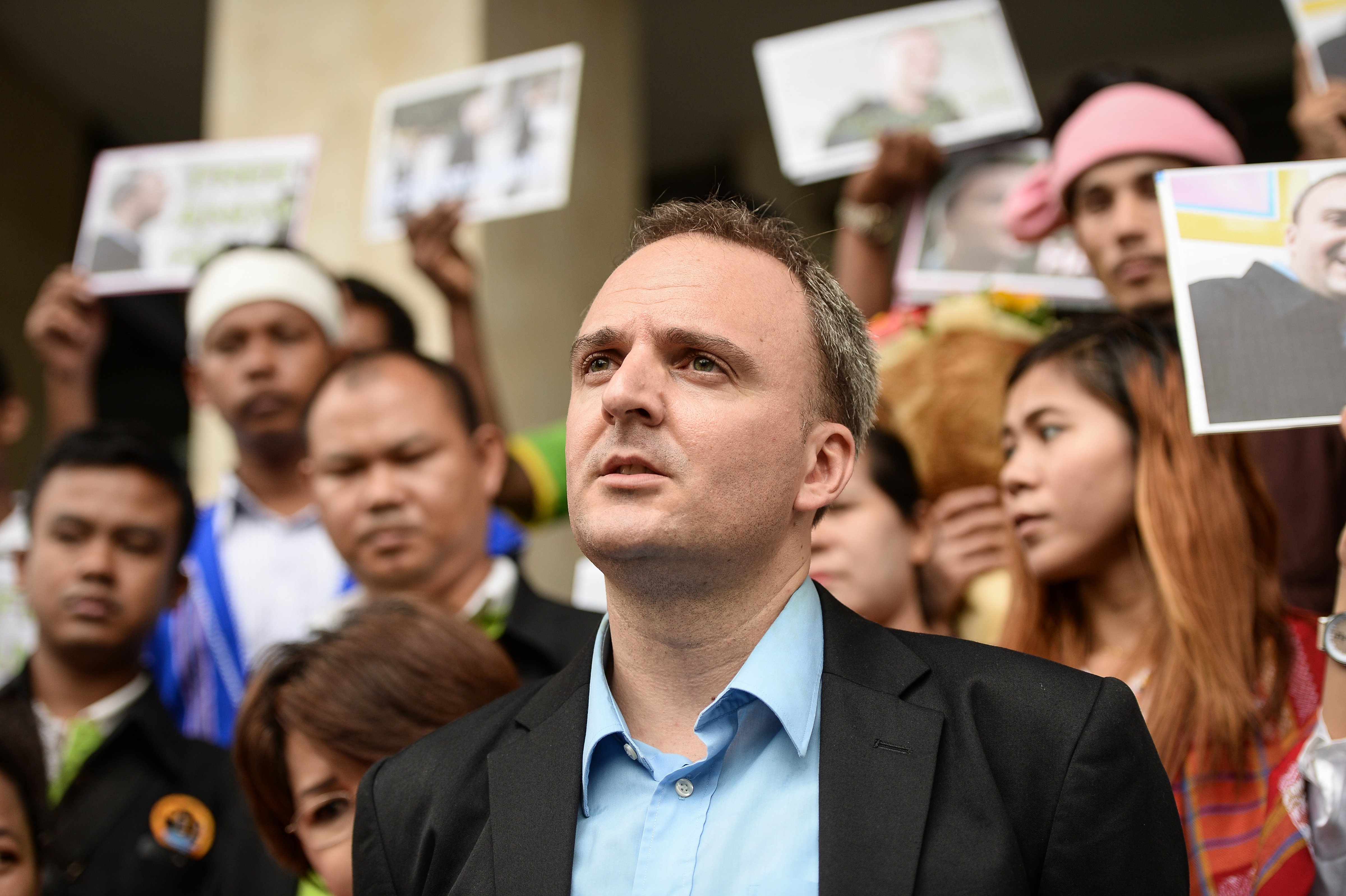 British activist Andy Hall speaks to the media at the Bangkok South Criminal Court after the verdict was announced on Sept. 20, 2016 (Lillian Suwanrumpha—AFP/Getty Images)