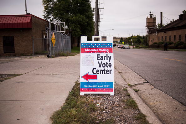 Signage at an early voting center in Minneapolis, Minnesota, on Sept. 23, 2016. (Stephen Maturen—Getty Images)