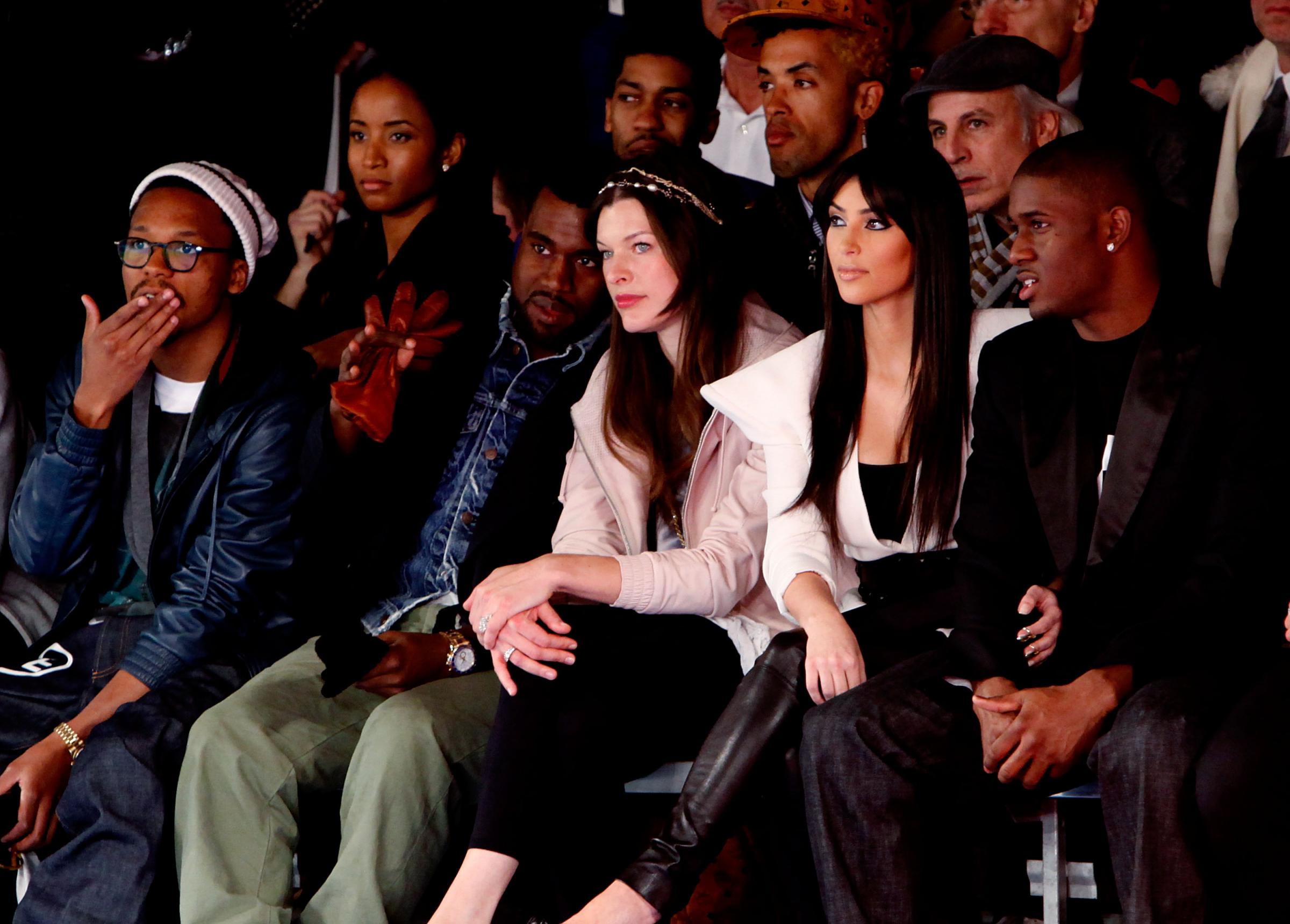 Lupe Fiasco, Kanye West, Milla Jovovich, Kim Kardashian and Reggie Bush at the Y-3 Fall/Winter 2009 fashion show. (Photo by Joe Kohen/WireImage)