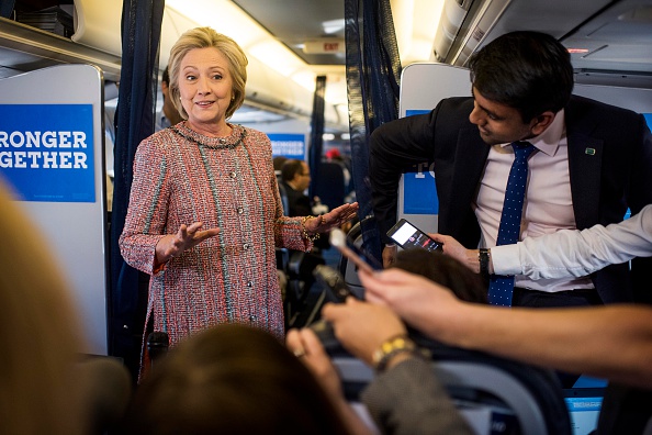 After several days of recovering from pneumonia at home, Democratic Nominee for President of the United States former Secretary of State Hillary Clinton returns to the campaign trail beginning her day by greeting the Press Corp aboard the campaign plane bound for Greensboro, North Carolina, in White Plains, New York on Thursday September 15, 2016. (The Washington Post—The Washington Post/Getty Images)