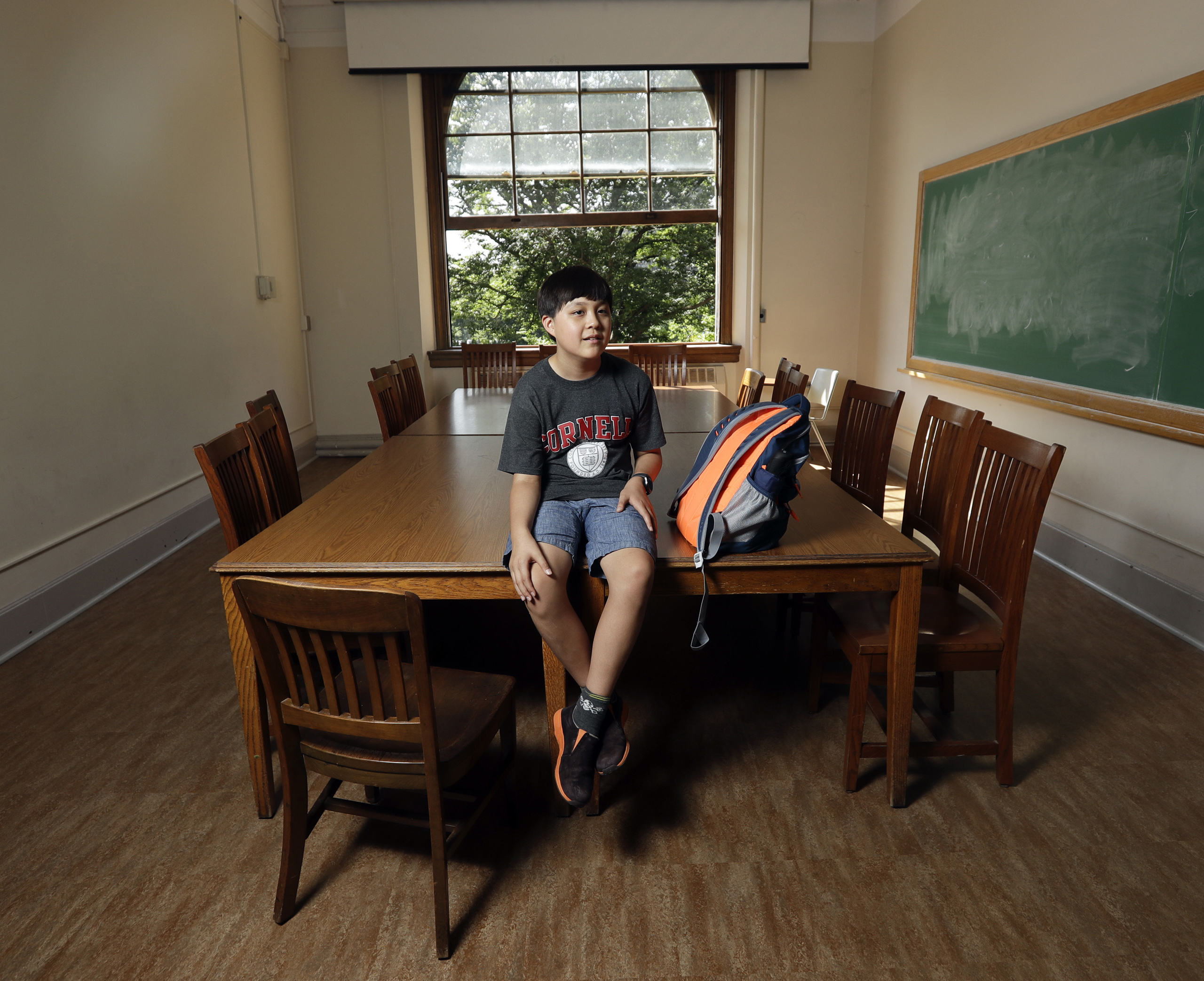 Jeremy Shuler, 12, a freshman at Cornell University, poses on campus in Ithaca, N.Y. He’s the youngest student on record to attend the Ivy League school on Aug. 26, 2016. (Mike Groll—AP)