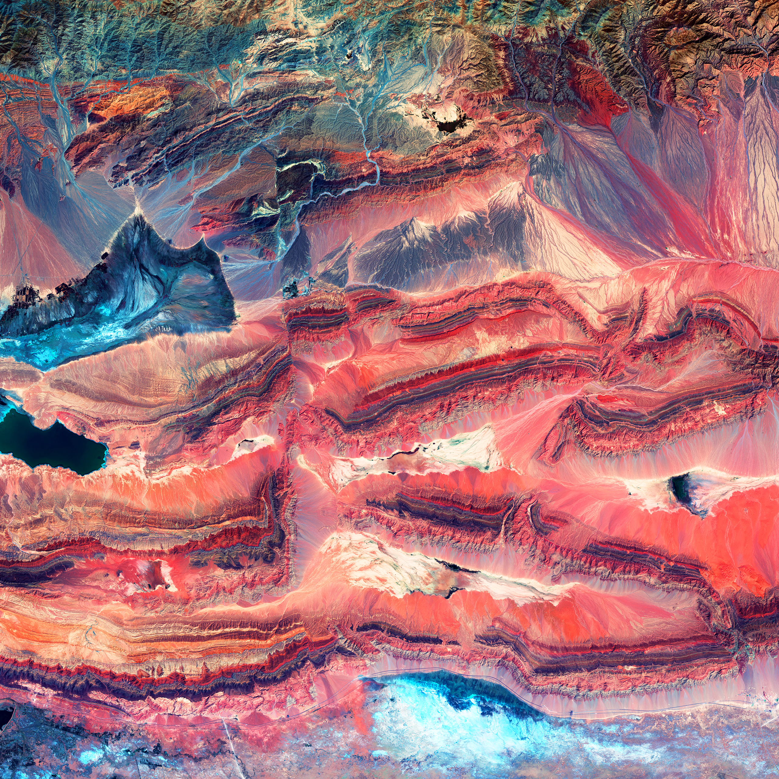 Western ChinaDifferent colors in this image of geologic faults indicate rocks that formed at different times and in different environments. July 30, 2013.