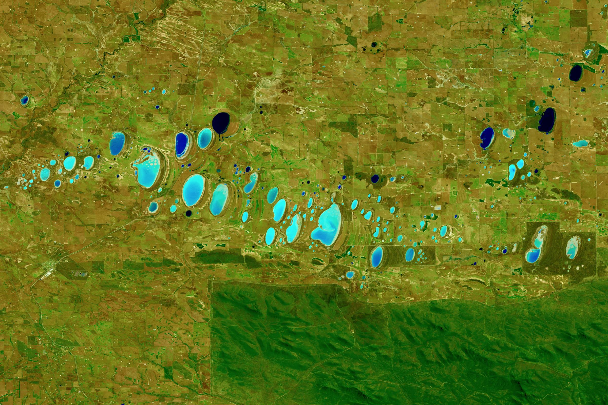 Stirling Range National Park, AustraliaA shortwave infrared image of chain of saline lakes, which vary in color as a result of differing sediments, aquatic and terrestrial plant growth, water chemistry, algae, and hydrology. Shortwave infrared is helpful in differentiating wet earth from dry earth. Oct. 21, 2015.
