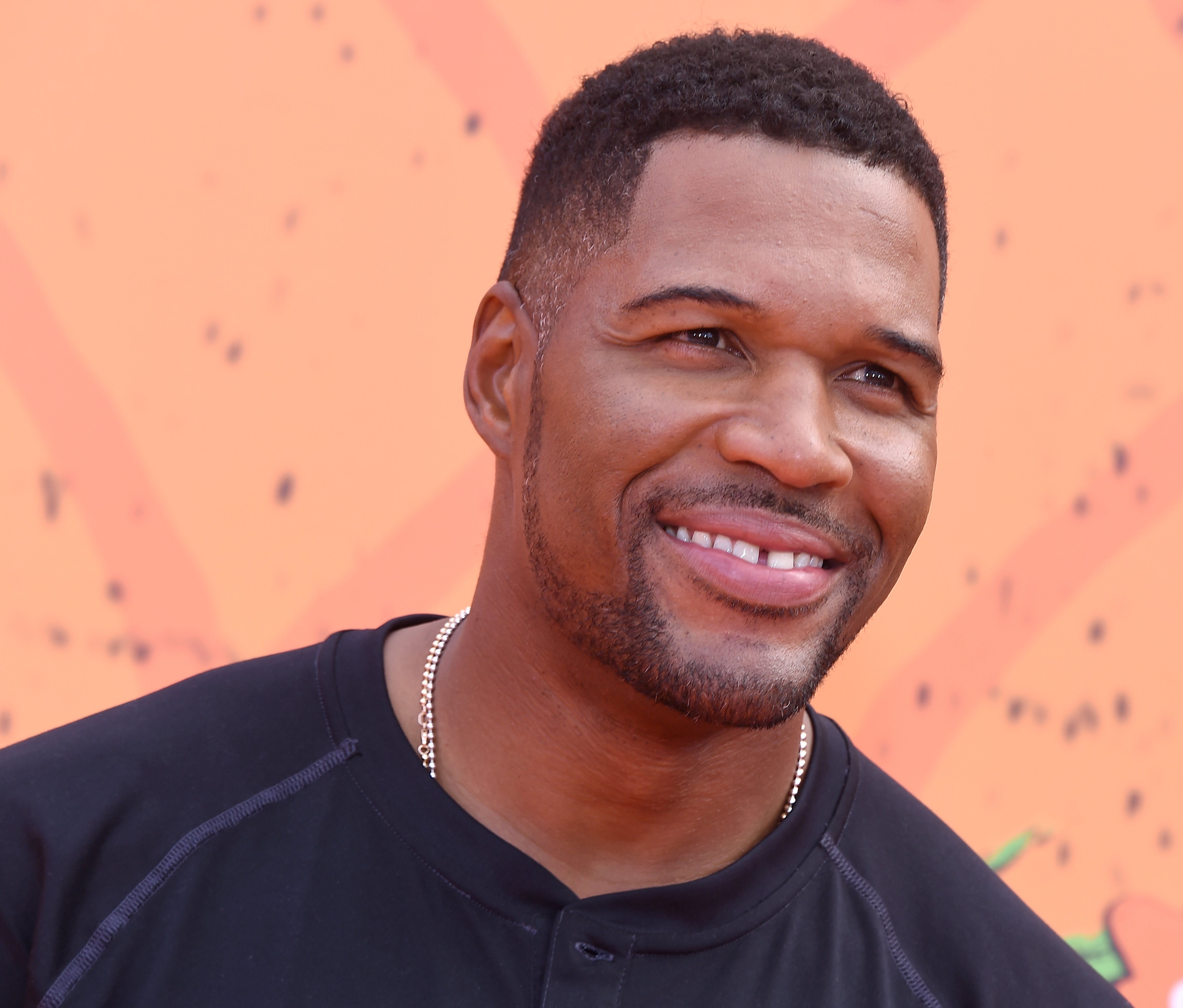 Michael Strahan arrives at Nickelodeon Kids' Choice Sports Awards 2016 at UCLA's Pauley Pavilion on July 14, 2016 in Westwood, California. (Gregg DeGuire—WireImage/Getty Images)