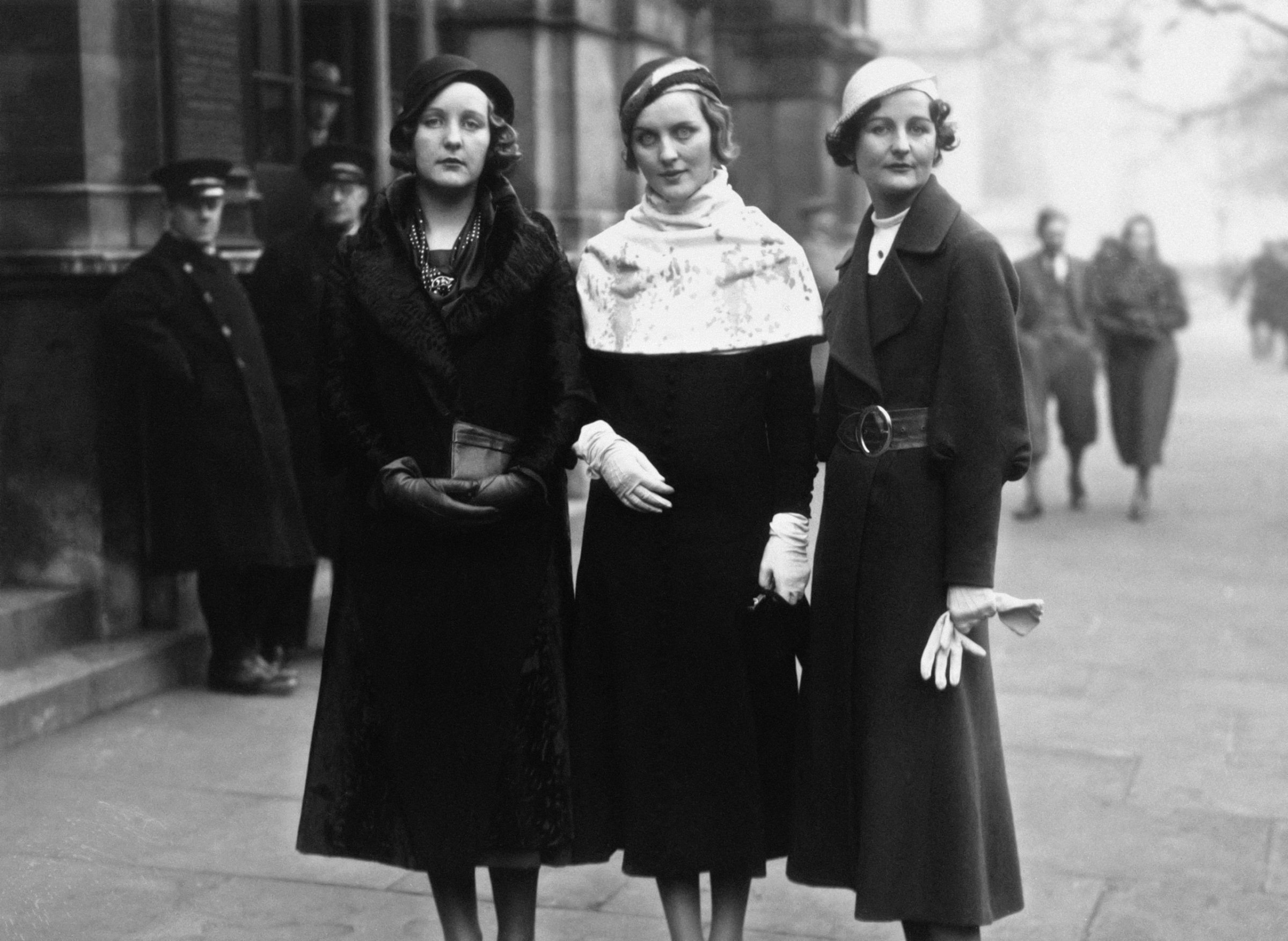 Three of the Mitford sisters at Lord Stanley of Aldernay's wedding. From left to right: Unity Mitford; Diana Mitford and writer Nancy Mitford in 1932.