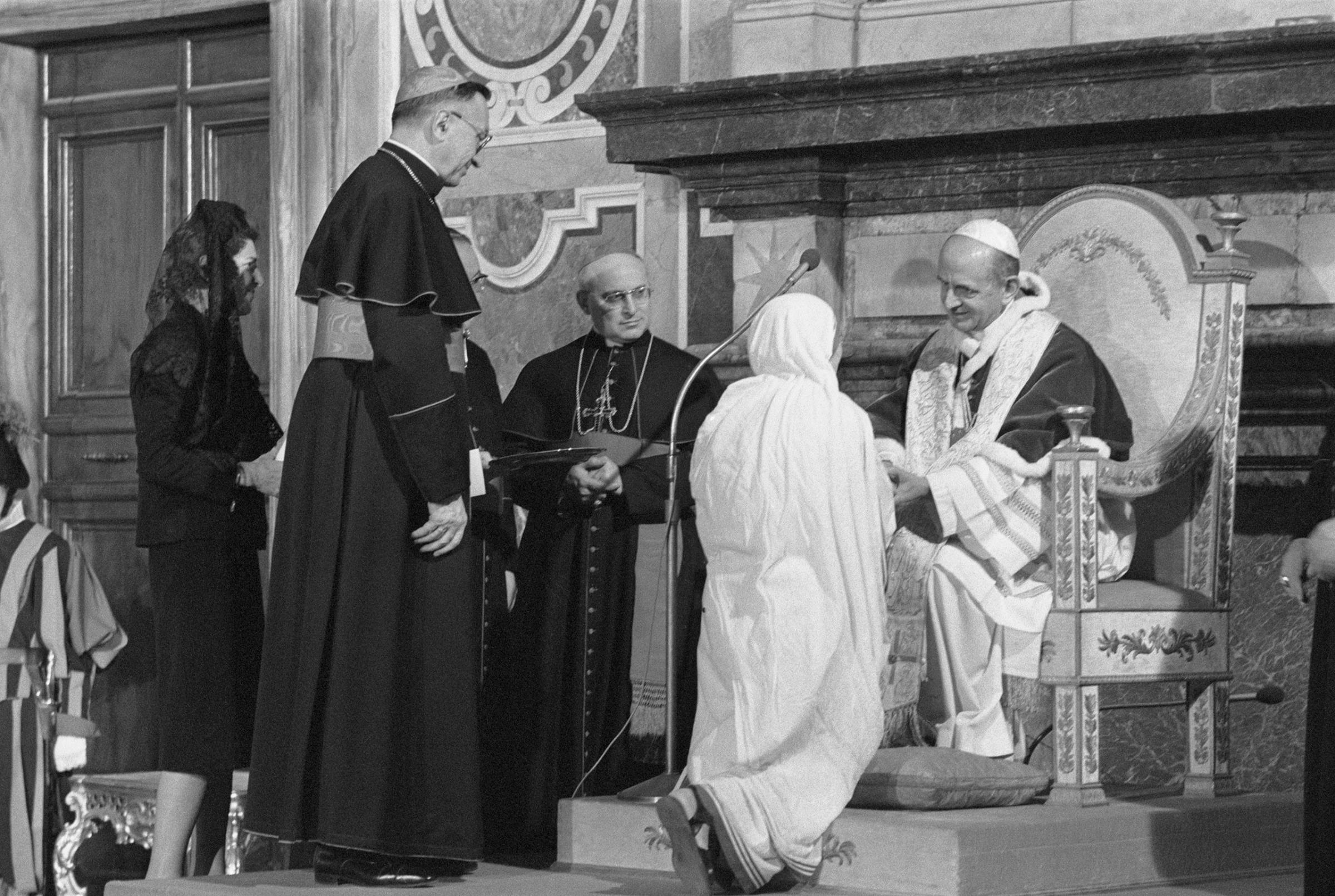 Pope Paul VI awards the first Pope John XXIII Peace Prize to Mother Teresa for her work among the poor in Calcutta and her founding of an order dedicated working with the poor.