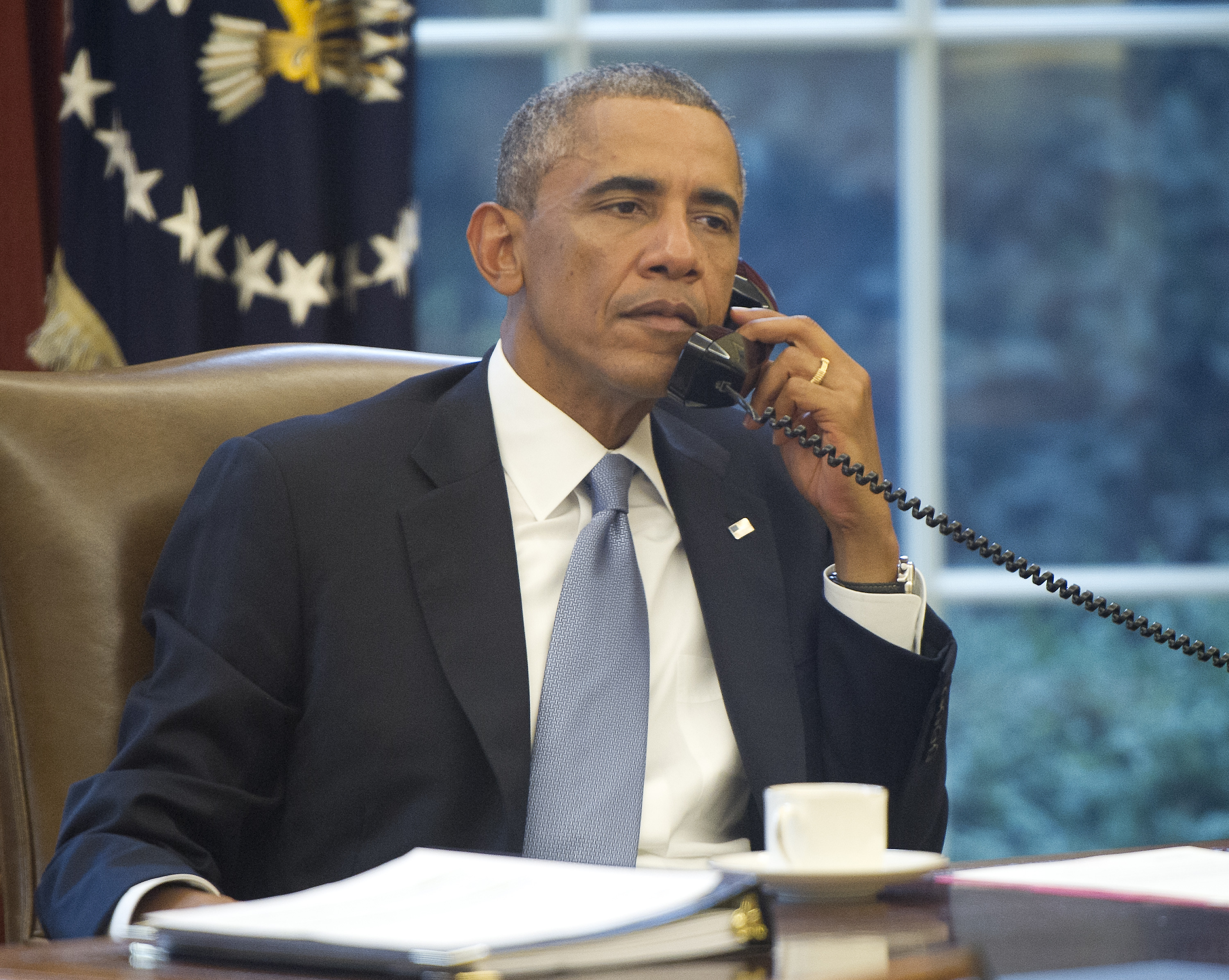 President Obama speaks on the phone with King Abdallah Abd al Aziz of the Kingdom of Saudi Arabia at White House in Washington, on Sept. 10, 2014 (Ron Sachs—DPA/AP Images)
