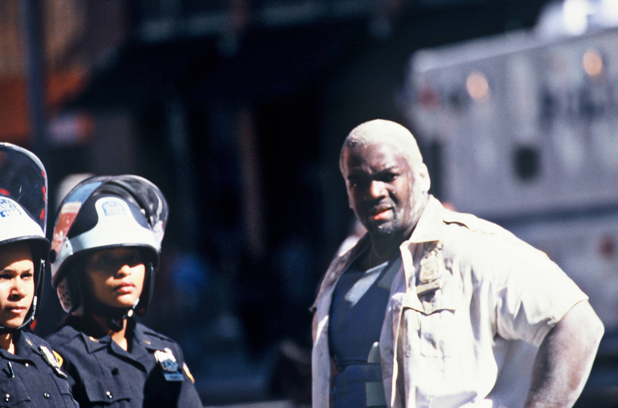 A dust covered police officer stands in Tribeca just after both of the twin towers had collapsed, on Sept. 11, 2001.